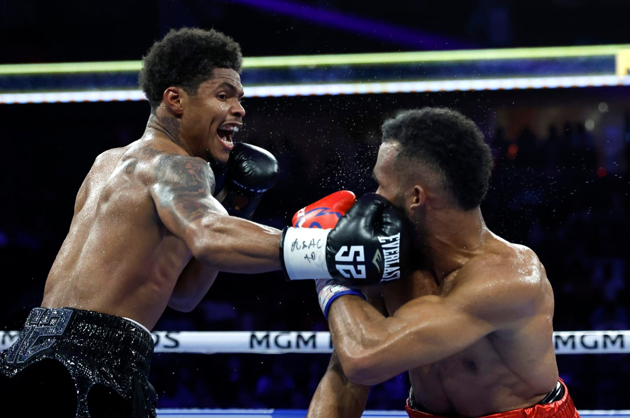 LAS VEGAS, NEVADA - NOVEMBER 16: Shakur Stevenson (L) punches Edwin De Los Santos during a fight for a vacant WBC lightweight title on November 16, 2023 in Las Vegas, Nevada. Stevenson won the vacant title by unanimous decision. (Photo by Steve Marcus/Getty Images) LAS VEGAS, NEVADA - NOVEMBER 16: Shakur Stevenson (L) punches Edwin De Los Santos during a fight for a vacant WBC lightweight title on November 16, 2023 in Las Vegas, Nevada. Stevenson won the vacant title by unanimous decision. (Photo by Steve Marcus/Getty Images)