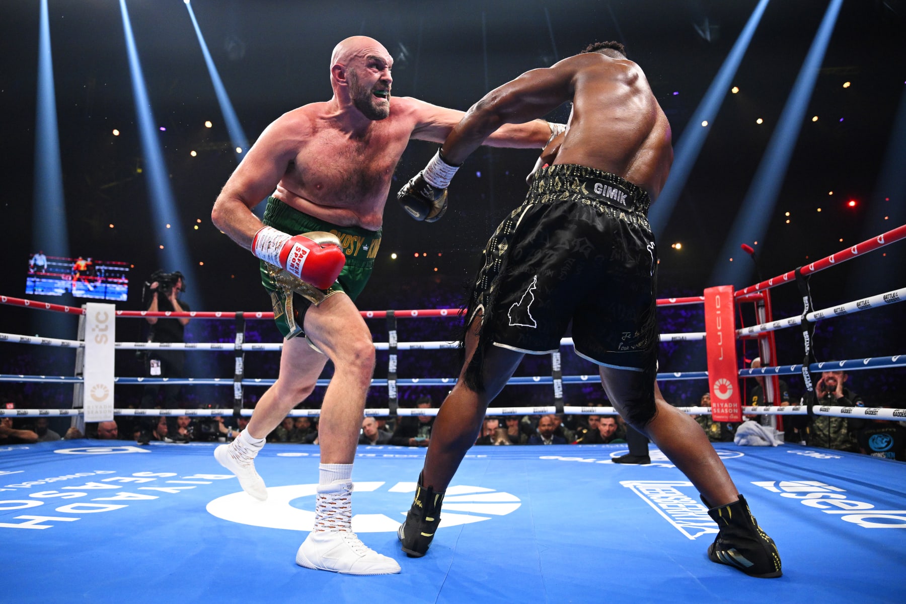RIYADH, SAUDI ARABIA - OCTOBER 28: Tyson Fury punches Francis Ngannou during the Heavyweight fight between Tyson Fury and Francis Ngannou at Boulevard Hall on October 28, 2023 in Riyadh, Saudi Arabia. (Photo by Justin Setterfield/Getty Images)