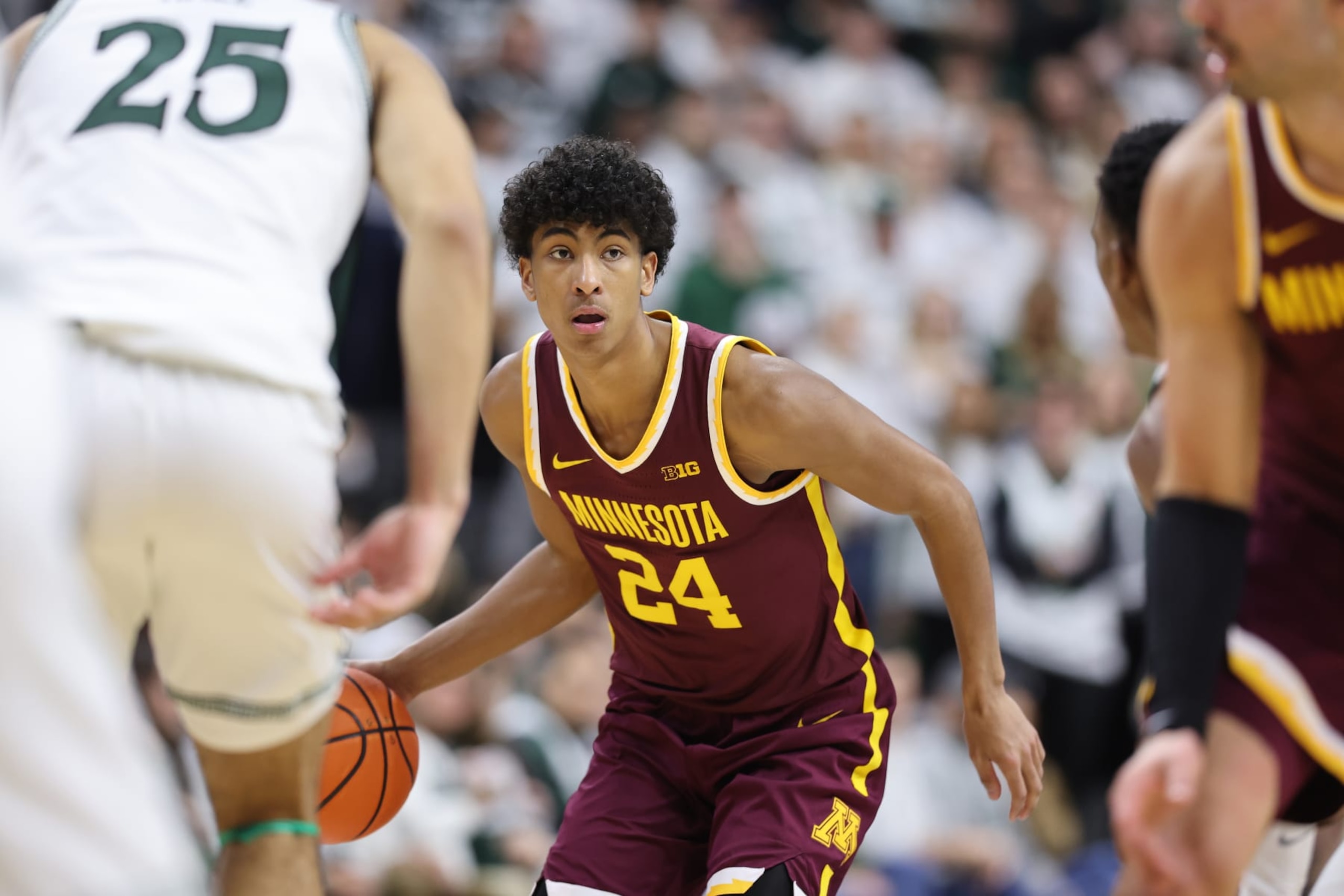 EAST LANSING, MICHIGAN - JANUARY 18: Cam Christie #24 of the Minnesota Golden Gophers handles the ball during the second half of the game against the Michigan State Spartans at Breslin Center on January 18, 2024 in East Lansing, Michigan. (Photo by Rey Del Rio/Getty Images)