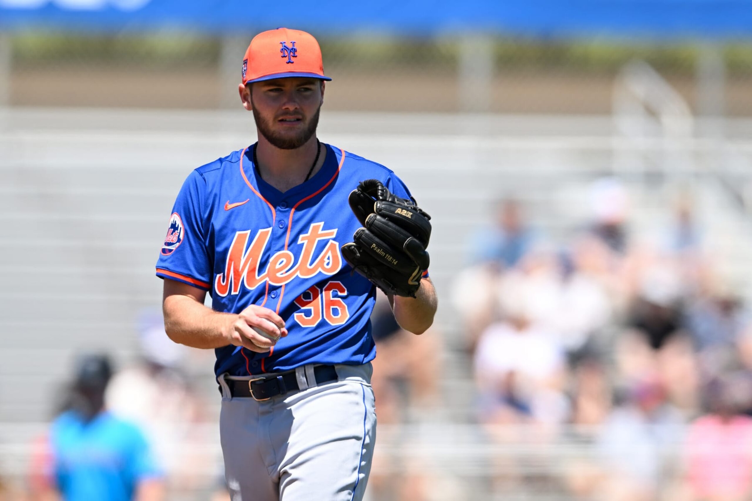 JUPITER, FLORIDA - MARCH 20, 2024: Christian Scott #96 of the New York Mets prepares to pitch during the first inning of a spring training game against the Miami Marlins at Roger Dean Chevrolet Stadium on March 20, 2024 in Jupiter, Florida. (Photo by Nick Cammett/Diamond Images via Getty Images)