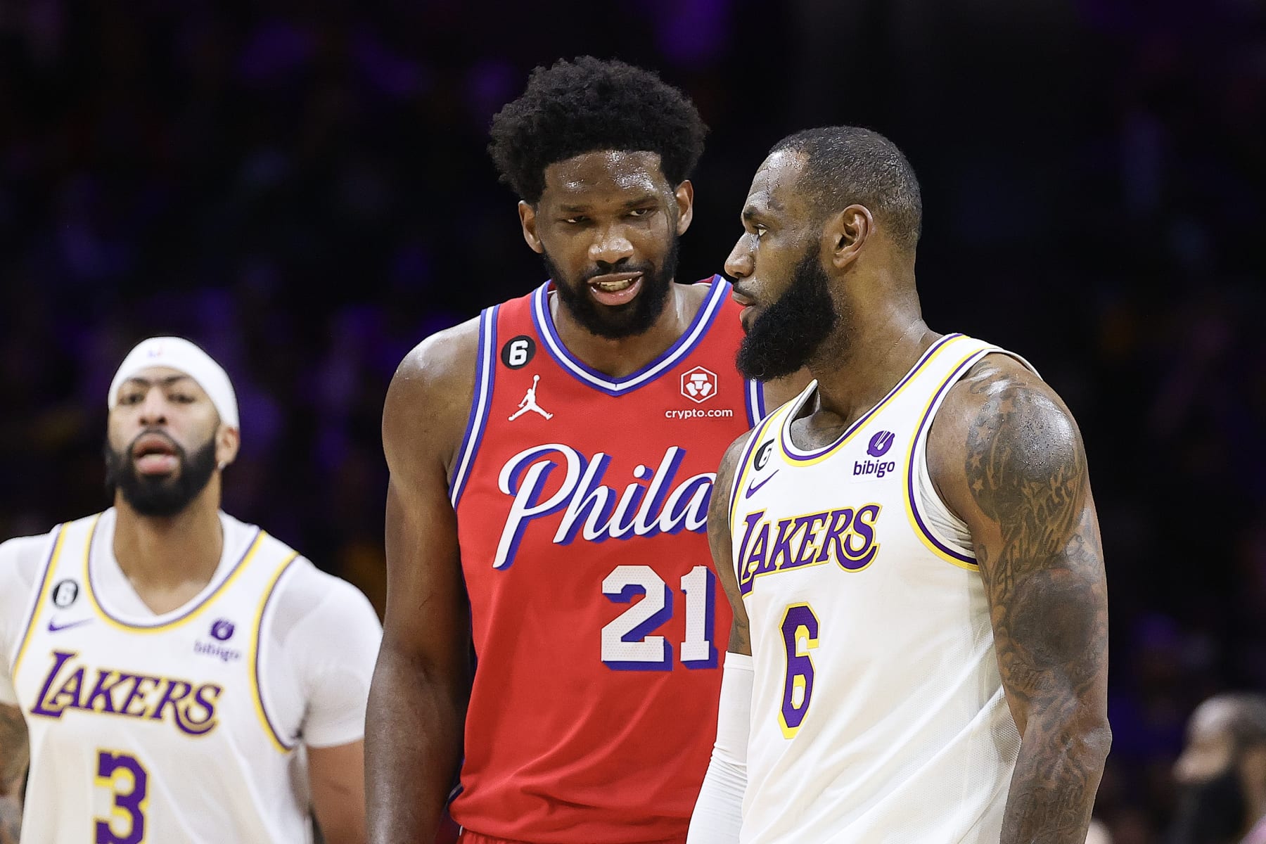 PHILADELPHIA, PENNSYLVANIA - DECEMBER 09: Joel Embiid #21 of the Philadelphia 76ers and LeBron James #6 of the Los Angeles Lakers speak during the fourth quarter at Wells Fargo Center on December 09, 2022 in Philadelphia, Pennsylvania. NOTE TO USER: User expressly acknowledges and agrees that, by downloading and or using this photograph, User is consenting to the terms and conditions of the Getty Images License Agreement. (Photo by Tim Nwachukwu/Getty Images)
