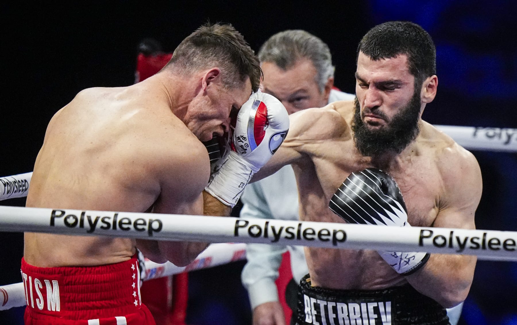 QUEBEC CITY, CANADA - JANUARY 13: Artur Beterbiev of Canada punches Callum Smith of the United Kingdom during their  WBC, IBF and WBO light-heavyweight world championship fight at Videotron Centre on January 13, 2024 in Quebec City, Canada. (Photo by Mathieu Belanger/Getty Images)