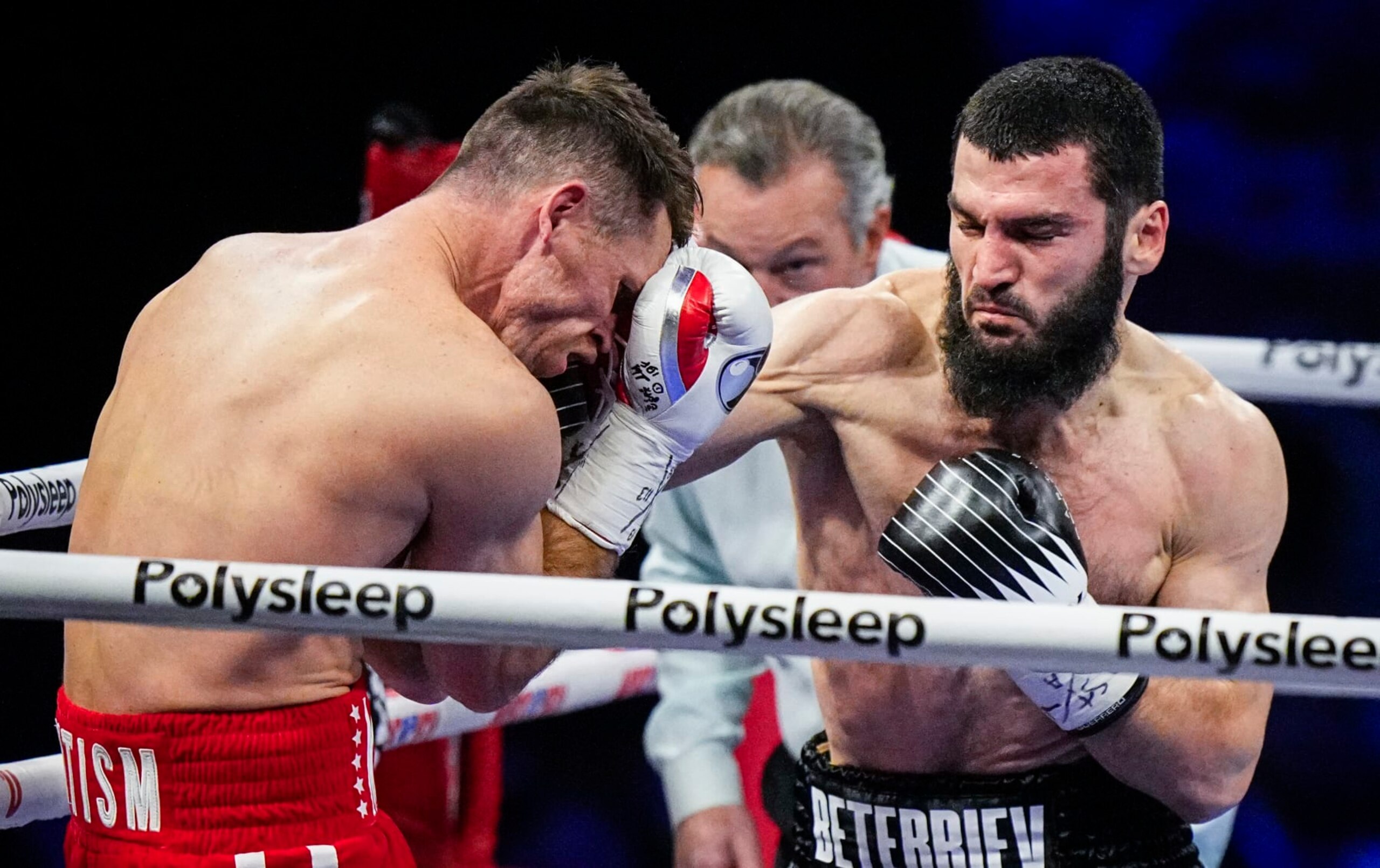 QUEBEC CITY, CANADA - JANUARY 13: Artur Beterbiev of Canada punches Callum Smith of the United Kingdom during their WBC, IBF and WBO light-heavyweight world championship fight at Videotron Centre on January 13, 2024 in Quebec City, Canada. (Photo by Mathieu Belanger/Getty Images) QUEBEC CITY, CANADA - JANUARY 13: Artur Beterbiev of Canada punches Callum Smith of the United Kingdom during their WBC, IBF and WBO light-heavyweight world championship fight at Videotron Centre on January 13, 2024 in Quebec City, Canada. (Photo by Mathieu Belanger/Getty Images)