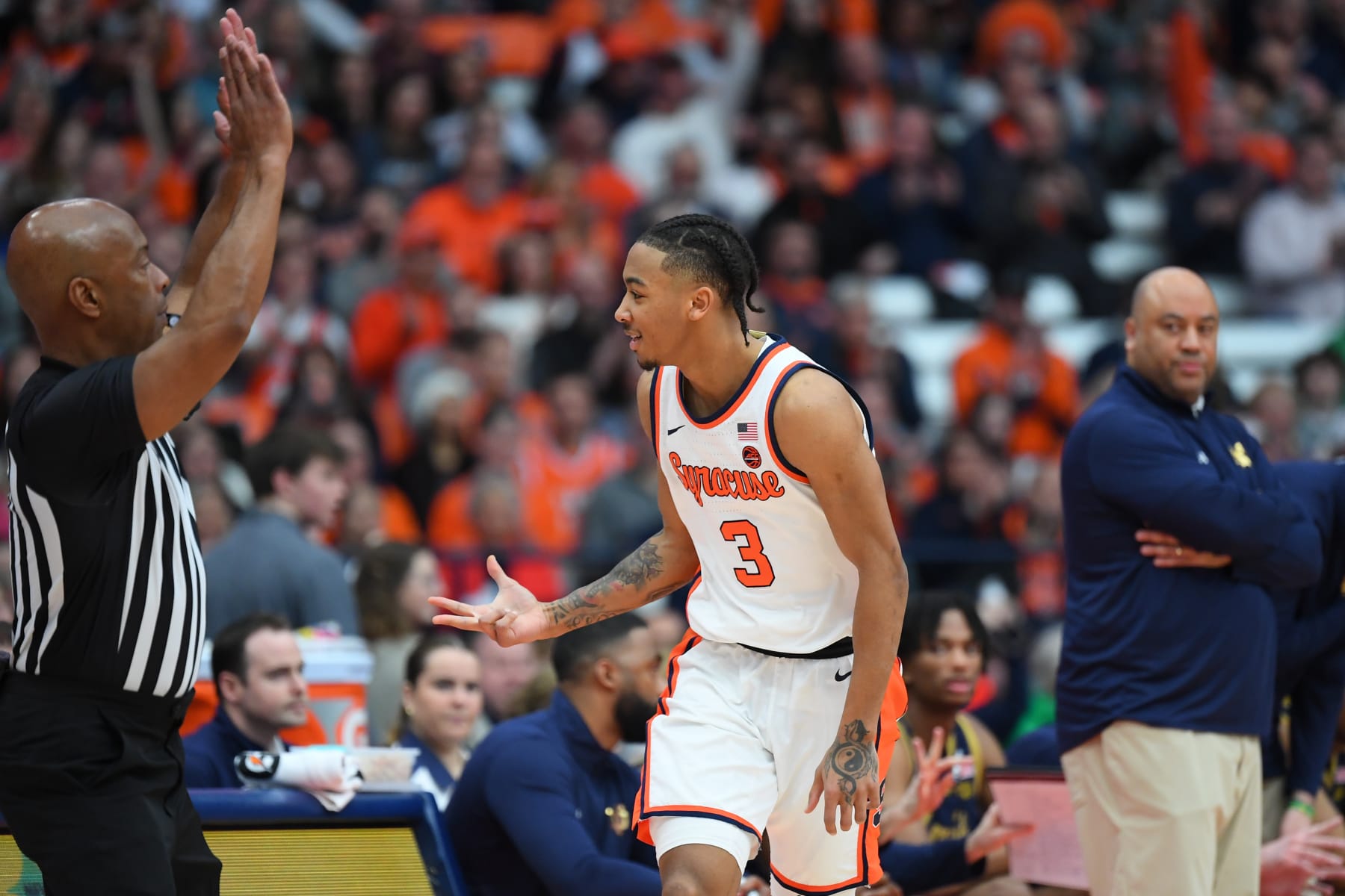 SYRACUSE, NEW YORK - FEBRUARY 24: Judah Mintz #3 of the Syracuse Orange reacts to his three-point basket against the Notre Dame Fighting Irish during the first half at the JMA Wireless Dome on February 24, 2024 in Syracuse, New York. (Photo by Rich Barnes/Getty Images)