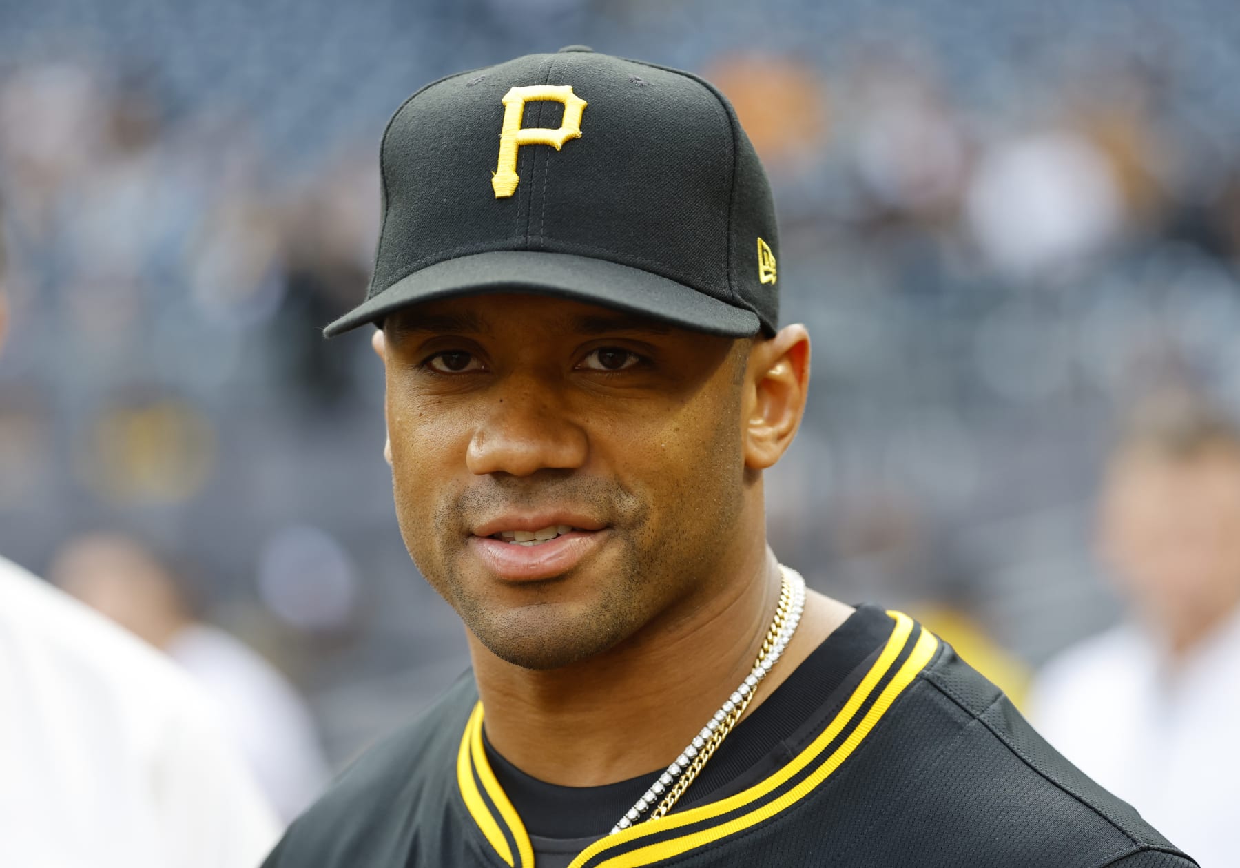 PITTSBURGH, PA - APRIL 19:  Russell Wilson of the Pittsburgh Steelers looks on before the game between the Pittsburgh Pirates and the Boston Red Sox at PNC Park on April 19, 2024 in Pittsburgh, Pennsylvania.  (Photo by Justin K. Aller/Getty Images)