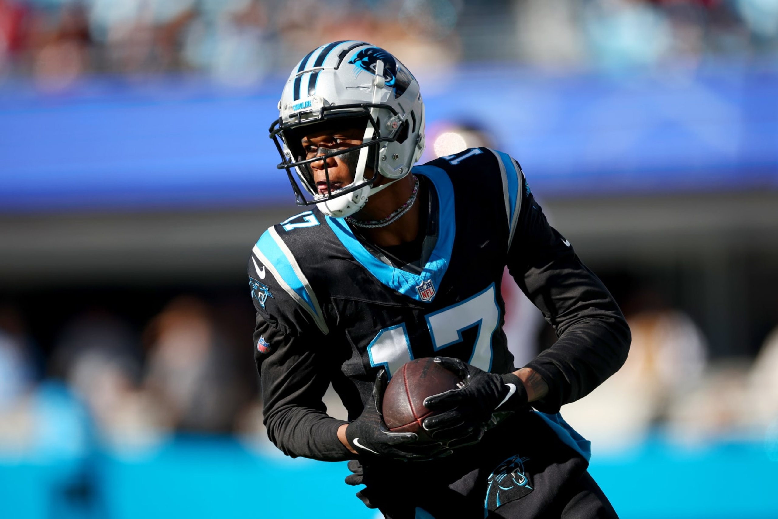 CHARLOTTE, NORTH CAROLINA - JANUARY 07: DJ Chark Jr. #17 of the Carolina Panthers carries the ball during the first half of the game against the Tampa Bay Buccaneers at Bank of America Stadium on January 07, 2024 in Charlotte, North Carolina. (Photo by Jared C. Tilton/Getty Images)