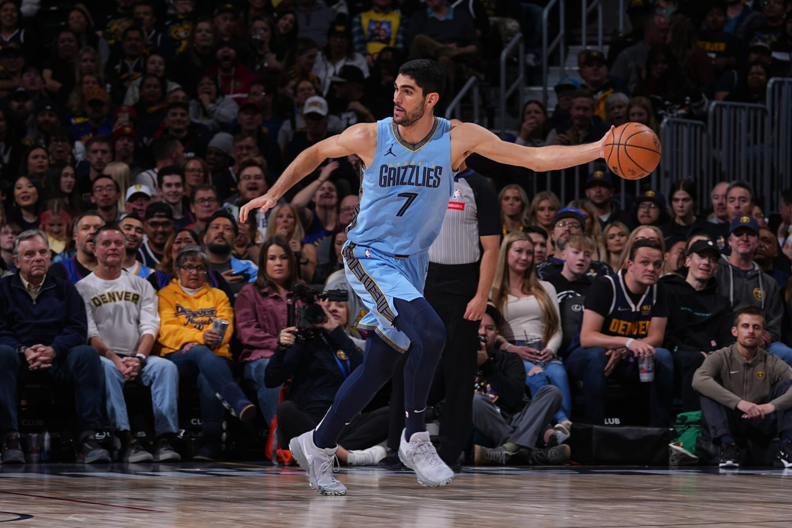 DENVER, CO - MARCH 25: Santi Aldama #7 of the Memphis Grizzlies handles the ball during the game against the Denver Nuggets on March 25, 2024 at the Ball Arena in Denver, Colorado. NOTE TO USER: User expressly acknowledges and agrees that, by downloading and/or using this Photograph, user is consenting to the terms and conditions of the Getty Images License Agreement. Mandatory Copyright Notice: Copyright 2024 NBAE (Photo by Bart Young/NBAE via Getty Images)