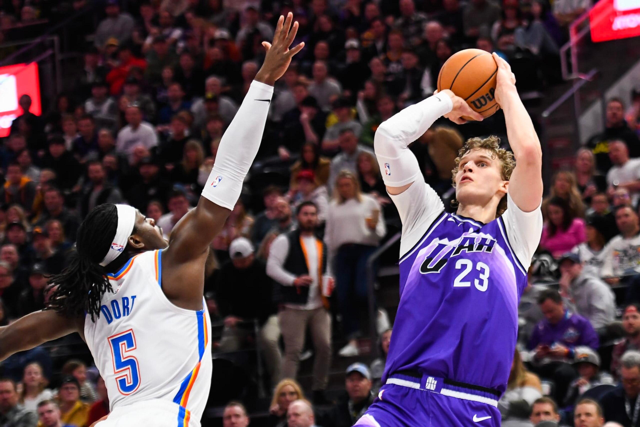 SALT LAKE CITY, UTAH - FEBRUARY 06: Lauri Markkanen #23 of the Utah Jazz shoots over Luguentz Dort #5 of the Oklahoma City Thunder during the first half at Delta Center on February 06, 2024 in Salt Lake City, Utah. NOTE TO USER: User expressly acknowledges and agrees that, by downloading and or using this photograph, User is consenting to the terms and conditions of the Getty Images License Agreement. (Photo by Alex Goodlett/Getty Images)