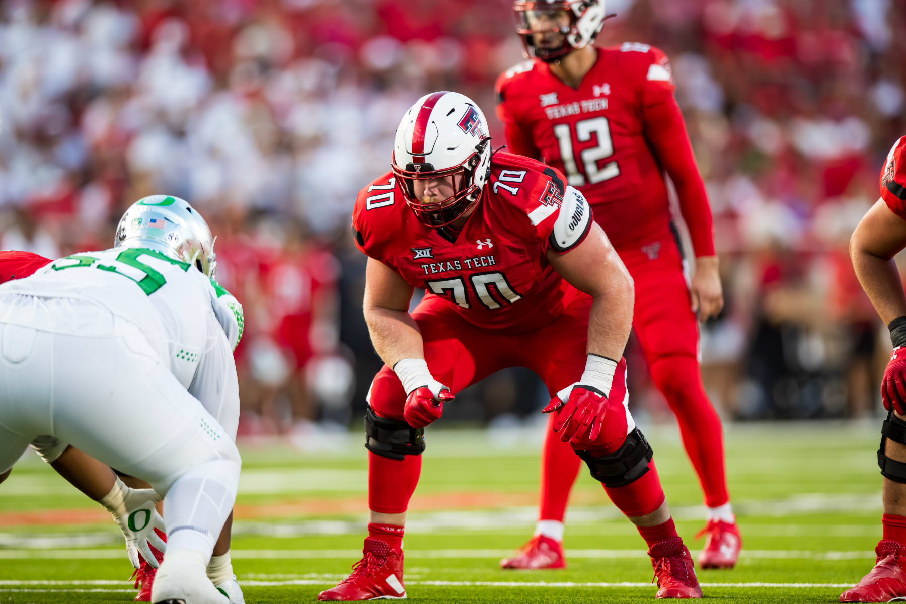 LUBBOCK, TEXAS - SEPTEMBER 09: Cole Spencer #70 of the Texas Tech Red Raiders lines up during the first half of the game against the Oregon Ducks at Jones AT&T Stadium on September 09, 2023 in Lubbock, Texas. (Photo by John E. Moore III/Getty Images)