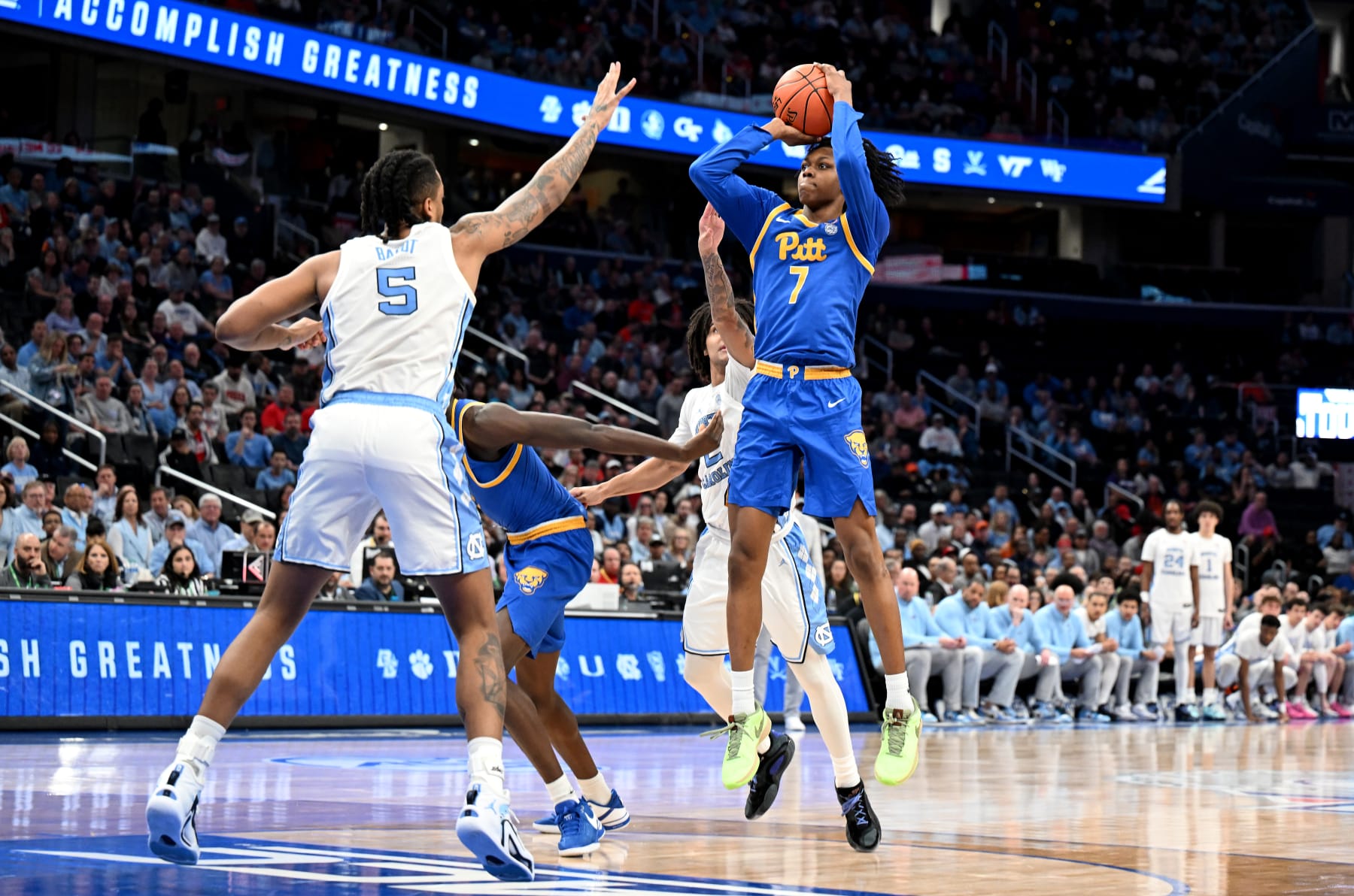 WASHINGTON, DC - MARCH 15: Carlton Carrington #7 of the Pittsburgh Panthers shoots the ball in the second half against Armando Bacot #5 of the North Carolina Tar Heels in the Semifinals of the ACC Men's Basketball Tournament  at Capital One Arena on March 15, 2024 in Washington, DC.  (Photo by Greg Fiume/Getty Images)