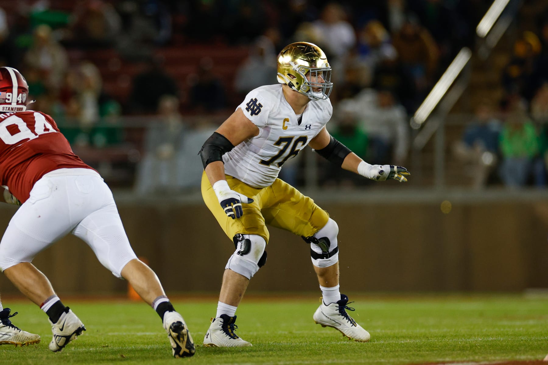 STANFORD, CALIFORNIA - NOVEMBER 25: Joe Alt #76 of the Notre Dame Fighting Irish blocks in the second half during a game against the Stanford Cardinal at Stanford Stadium on November 25, 2023 in Stanford, California. (Photo by Brandon Sloter/Image Of Sport/Getty Images)