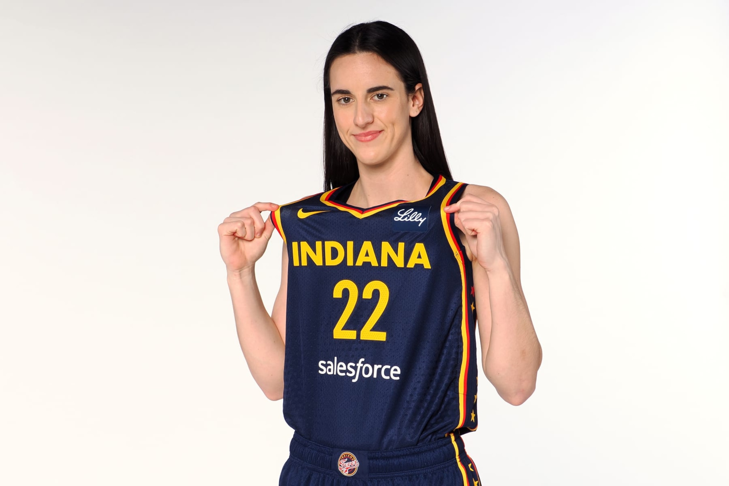 INDIANAPOLIS, IN - MAY 1: Caitlin Clark #22 of the Indiana Fever poses for a portrait during the WNBA Indiana Fever Media Day on May 1, 2024 at Gainbridge Fieldhouse in Indianapolis, Indiana. NOTE TO USER: User expressly acknowledges and agrees that, by downloading and or using this Photograph, user is consenting to the terms and conditions of the Getty Images License Agreement. Mandatory Copyright Notice: Copyright 2024 NBAE (Photo by Ron Hoskins/NBAE via Getty Images) INDIANAPOLIS, IN - MAY 1: Caitlin Clark #22 of the Indiana Fever poses for a portrait during the WNBA Indiana Fever Media Day on May 1, 2024 at Gainbridge Fieldhouse in Indianapolis, Indiana. NOTE TO USER: User expressly acknowledges and agrees that, by downloading and or using this Photograph, user is consenting to the terms and conditions of the Getty Images License Agreement. Mandatory Copyright Notice: Copyright 2024 NBAE (Photo by Ron Hoskins/NBAE via Getty Images)