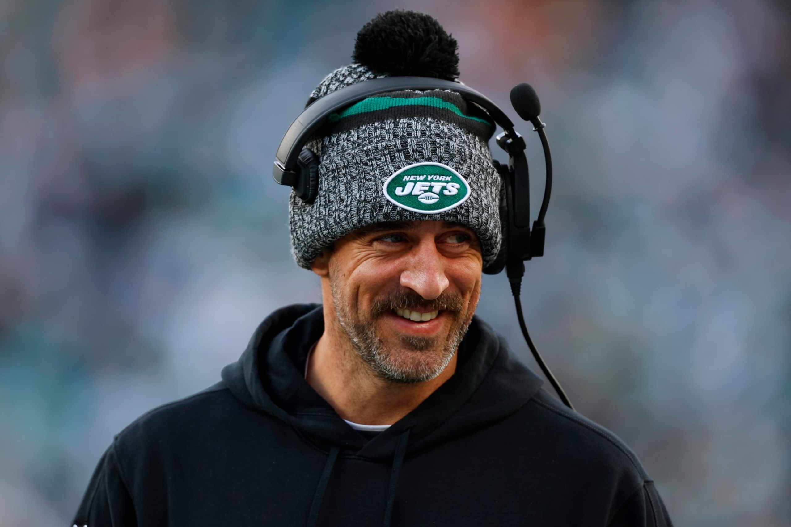 EAST RUTHERFORD, NEW JERSEY - NOVEMBER 24: Quarterback Aaron Rodgers #8 of the New York Jets on the sidelines during a football game against the Miami Dolphins at MetLife Stadium on November 24, 2023 in East Rutherford, New Jersey. (Photo by Rich Schultz/Getty Images)