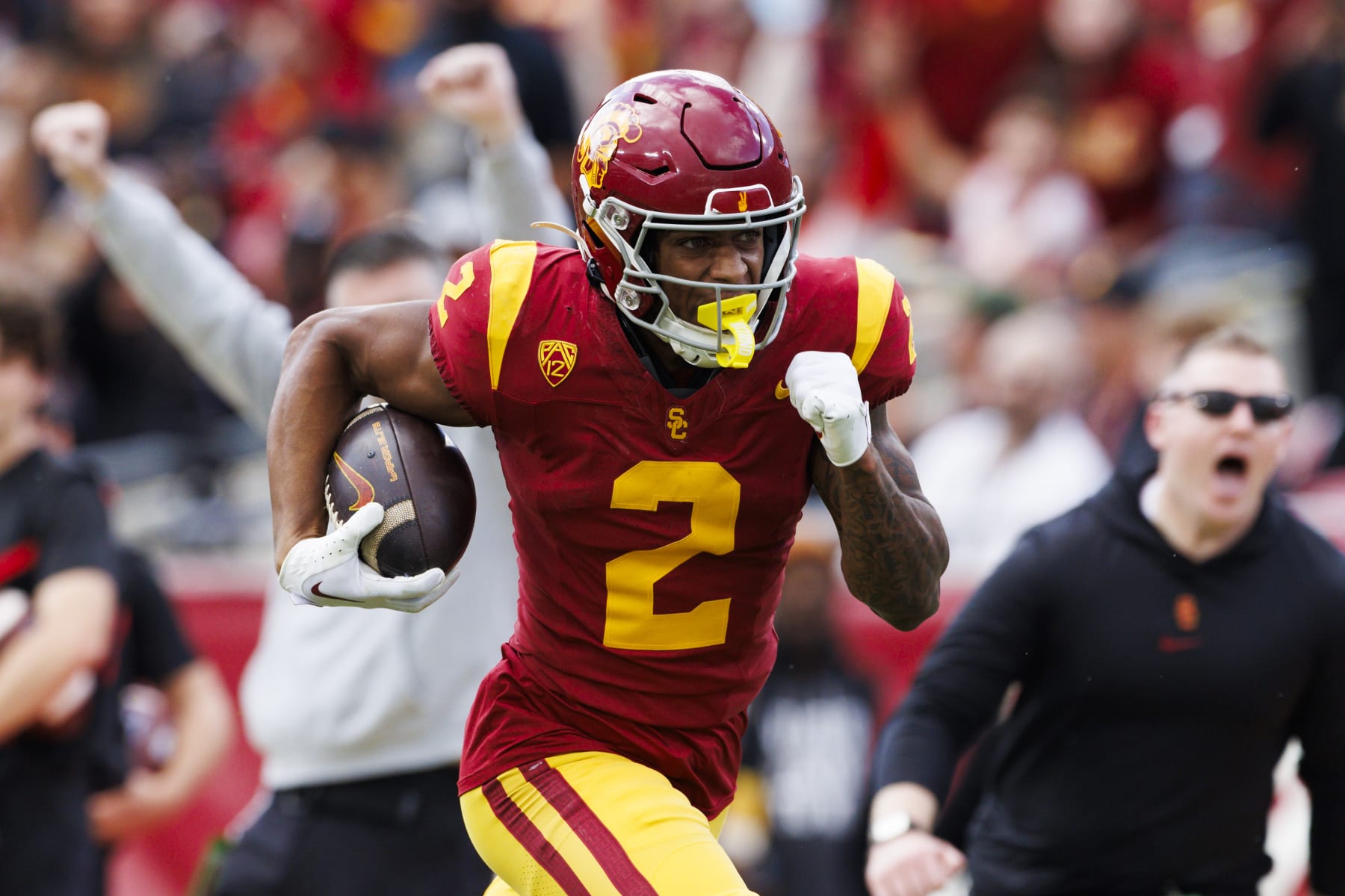 LOS ANGELES, CALIFORNIA - NOVEMBER 18: Brenden Rice #2 of the USC Trojans runs after the catch during a game against the UCLA Bruins at United Airlines Field at the Los Angeles Memorial Coliseum on November 11, 2023 in Los Angeles, California. (Photo by Ric Tapia/Getty Images)