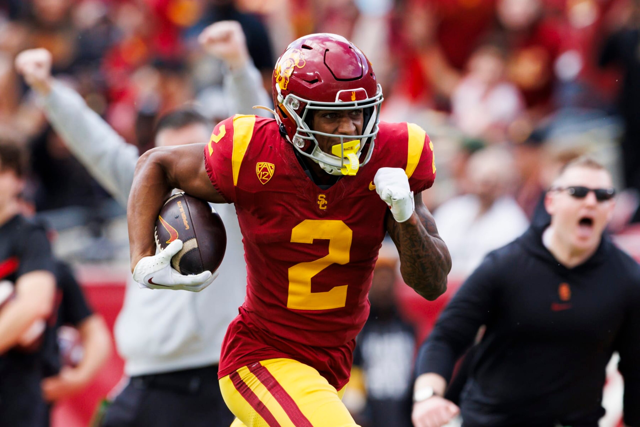 LOS ANGELES, CALIFORNIA - NOVEMBER 18: Brenden Rice #2 of the USC Trojans runs after the catch during a game against the UCLA Bruins at United Airlines Field at the Los Angeles Memorial Coliseum on November 11, 2023 in Los Angeles, California. (Photo by Ric Tapia/Getty Images) LOS ANGELES, CALIFORNIA - NOVEMBER 18: Brenden Rice #2 of the USC Trojans runs after the catch during a game against the UCLA Bruins at United Airlines Field at the Los Angeles Memorial Coliseum on November 11, 2023 in Los Angeles, California. (Photo by Ric Tapia/Getty Images)