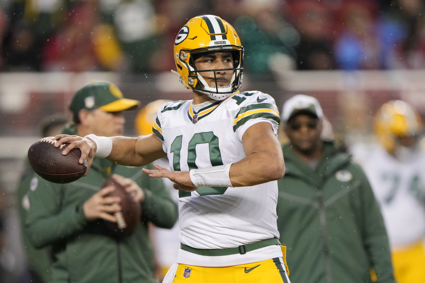 SANTA CLARA, CALIFORNIA - JANUARY 20: Jordan Love #10 of the Green Bay Packers warms up before the NFC Divisional Playoffs against the San Francisco 49ers at Levi's Stadium on January 20, 2024 in Santa Clara, California. (Photo by Thearon W. Henderson/Getty Images)
