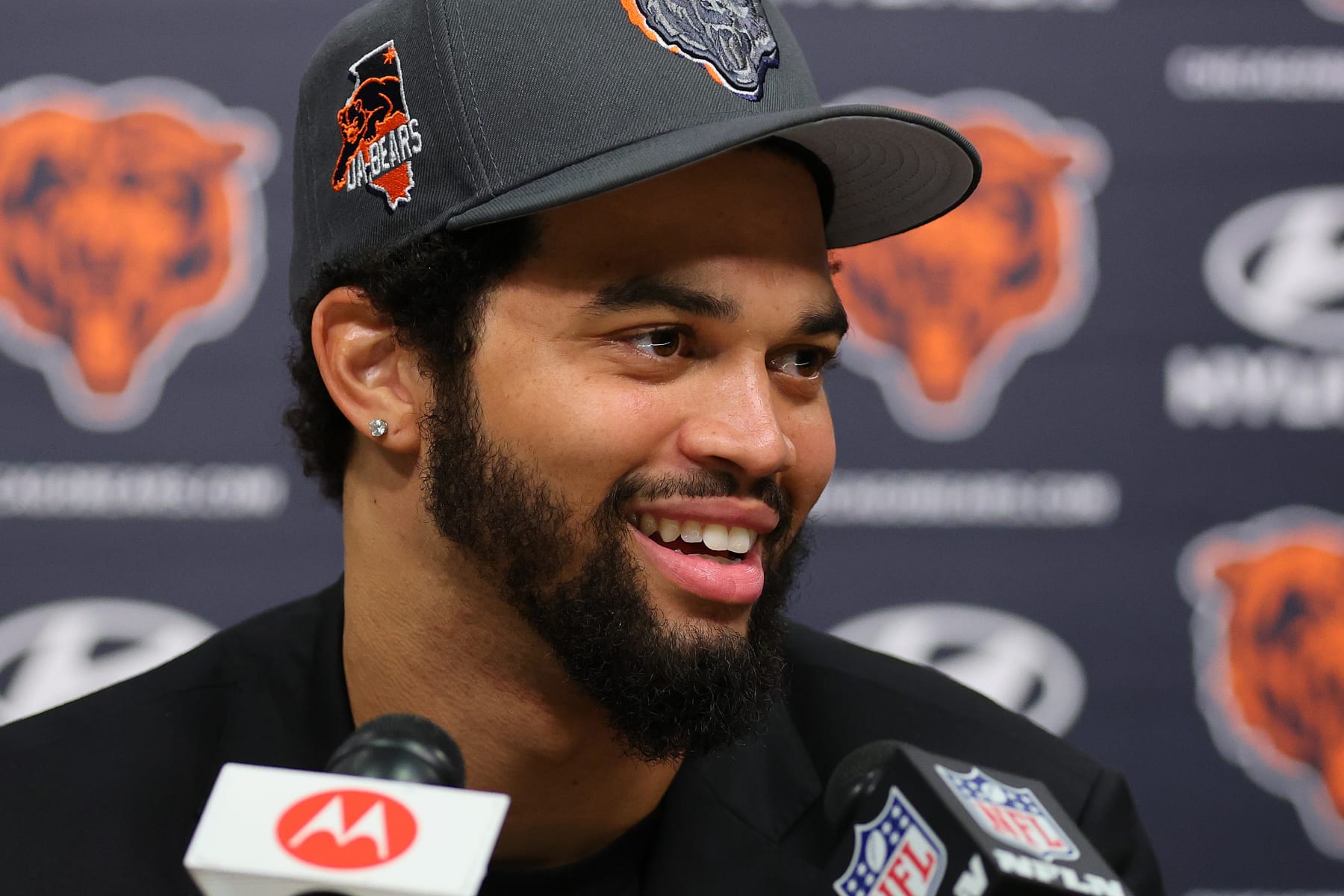 LAKE FOREST, ILLINOIS - APRIL 26: Caleb Williams #18 of the Chicago Bears speaks answers a question from the media during his introductory press conference at Halas Hall on April 26, 2024 in Lake Forest, Illinois. Caleb Williams was drafted first overall in the 2024 NFL Draft on Thursday. (Photo by Michael Reaves/Getty Images)