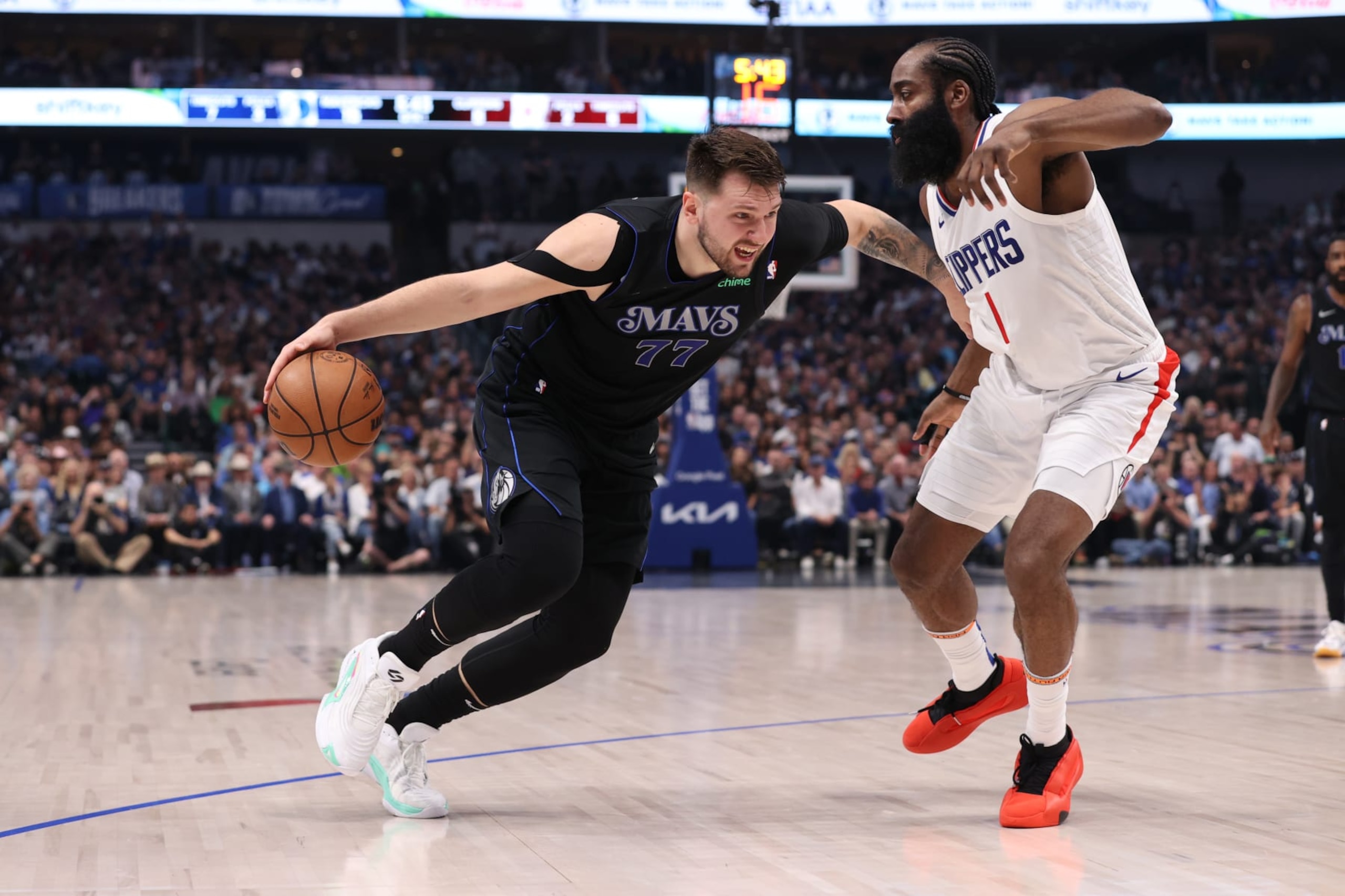 DALLAS, TX - MAY 3: Luka Doncic #77 of the Dallas Mavericks dribbles the ball during the game against the LA Clippers during Round 1 Game 6 of the 2024 NBA Playoffs on May 3, 2024 at the American Airlines Center in Dallas, Texas. NOTE TO USER: User expressly acknowledges and agrees that, by downloading and or using this photograph, User is consenting to the terms and conditions of the Getty Images License Agreement. Mandatory Copyright Notice: Copyright 2024 NBAE (Photo by Joe Murphy/NBAE via Getty Images) DALLAS, TX - MAY 3: Luka Doncic #77 of the Dallas Mavericks dribbles the ball during the game against the LA Clippers during Round 1 Game 6 of the 2024 NBA Playoffs on May 3, 2024 at the American Airlines Center in Dallas, Texas. NOTE TO USER: User expressly acknowledges and agrees that, by downloading and or using this photograph, User is consenting to the terms and conditions of the Getty Images License Agreement. Mandatory Copyright Notice: Copyright 2024 NBAE (Photo by Joe Murphy/NBAE via Getty Images)