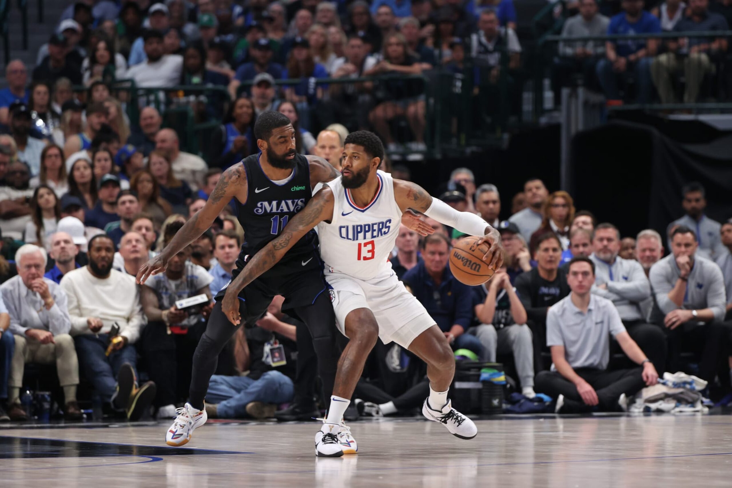 DALLAS, TX - MAY 3: Paul George #13 of the LA Clippers dribbles the ball during the game against the Dallas Mavericks during Round 1 Game 6 of the 2024 NBA Playoffs on May 3, 2024 at the American Airlines Center in Dallas, Texas. NOTE TO USER: User expressly acknowledges and agrees that, by downloading and or using this photograph, User is consenting to the terms and conditions of the Getty Images License Agreement. Mandatory Copyright Notice: Copyright 2024 NBAE (Photo by Joe Murphy/NBAE via Getty Images) DALLAS, TX - MAY 3: Paul George #13 of the LA Clippers dribbles the ball during the game against the Dallas Mavericks during Round 1 Game 6 of the 2024 NBA Playoffs on May 3, 2024 at the American Airlines Center in Dallas, Texas. NOTE TO USER: User expressly acknowledges and agrees that, by downloading and or using this photograph, User is consenting to the terms and conditions of the Getty Images License Agreement. Mandatory Copyright Notice: Copyright 2024 NBAE (Photo by Joe Murphy/NBAE via Getty Images)