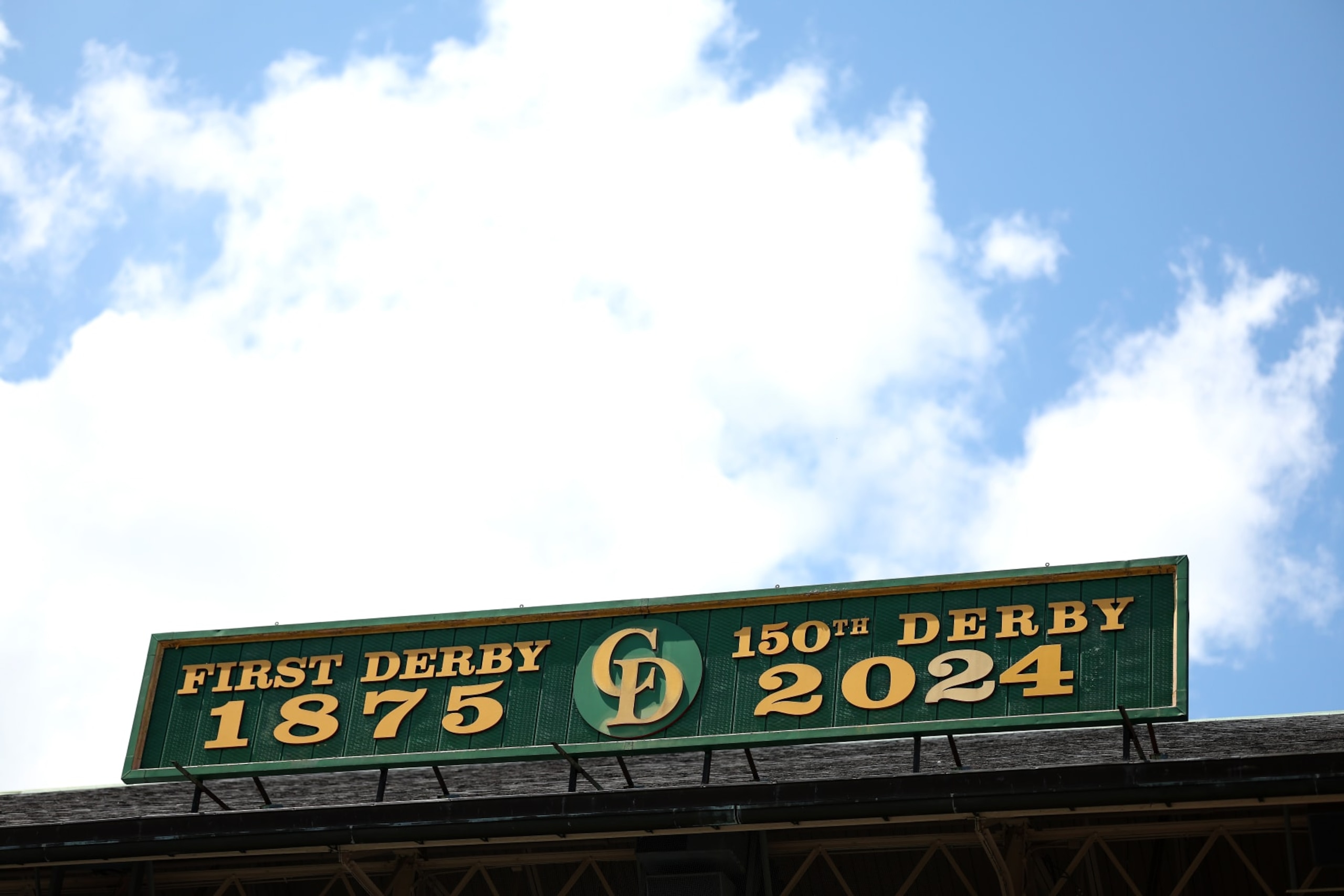 LOUISVILLE, KENTUCKY - MAY 04: A detail of the sign between the Twin Spires is shown before the running of the 150th  Kentucky Derby at Churchill Downs on May 04, 2024 in Louisville, Kentucky. (Photo by Rob Carr/Getty Images)