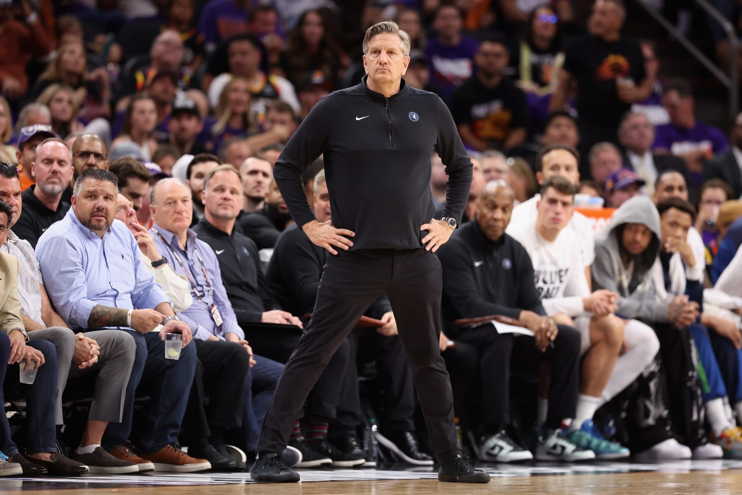 PHOENIX, ARIZONA - APRIL 26: Head coach Chris Finch of the Minnesota Timberwolves looks on during the first half of game three of the Western Conference First Round Playoffs against the Phoenix Suns at Footprint Center on April 26, 2024 in Phoenix, Arizona. NOTE TO USER: User expressly acknowledges and agrees that, by downloading and or using this photograph, User is consenting to the terms and conditions of the Getty Images License Agreement. NOTE TO USER: User expressly acknowledges and agrees that, by downloading and or using this photograph, User is consenting to the terms and conditions of the Getty Images License Agreement. ˆ (Photo by Christian Petersen/Getty Images)