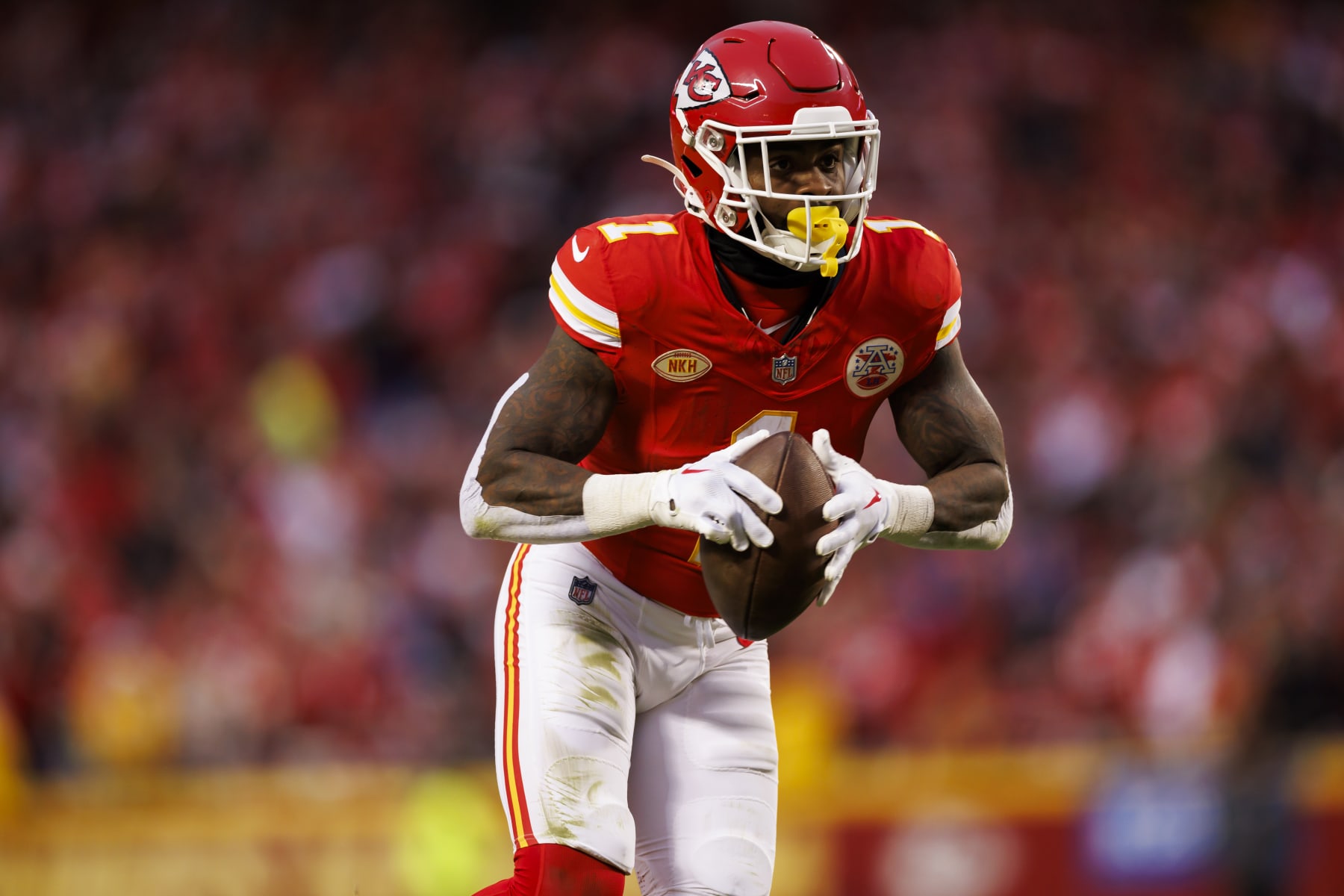 KANSAS CITY, MISSOURI - DECEMBER 10: Jerick McKinnon #1 of the Kansas City Chiefs runs the ball after a catch during an NFL football game against the Buffalo Bills at GEHA Field at Arrowhead Stadium on December 10, 2023 in Kansas City, Missouri. (Photo by Ryan Kang/Getty Images)