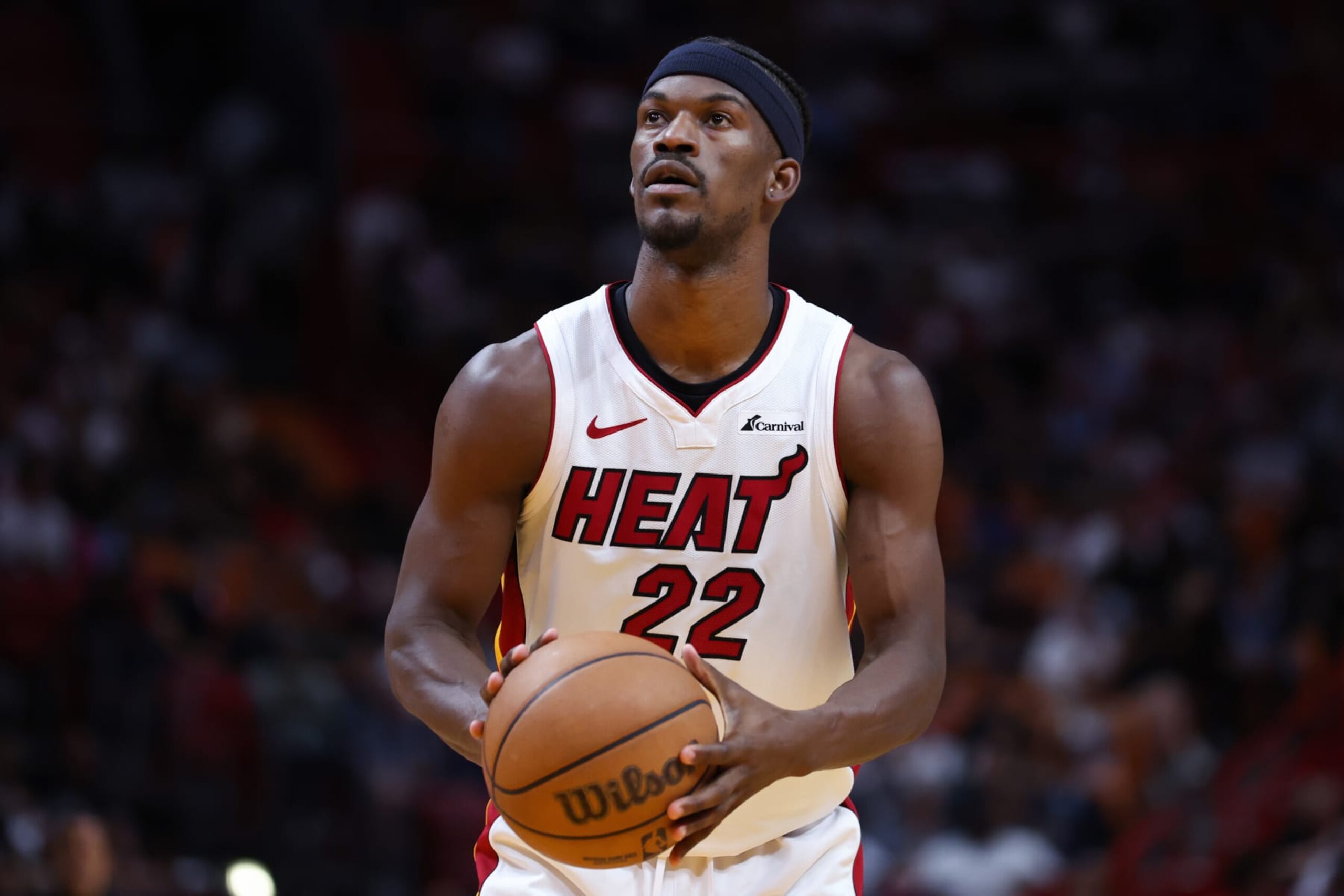 MIAMI, FLORIDA - APRIL 12: Jimmy Butler #22 of the Miami Heat shoots a free throw against the Toronto Raptors during the first quarter of the game at Kaseya Center on April 12, 2024 in Miami, Florida. NOTE TO USER: User expressly acknowledges and agrees that, by downloading and or using this photograph, User is consenting to the terms and conditions of the Getty Images License Agreement. (Photo by Megan Briggs/Getty Images)