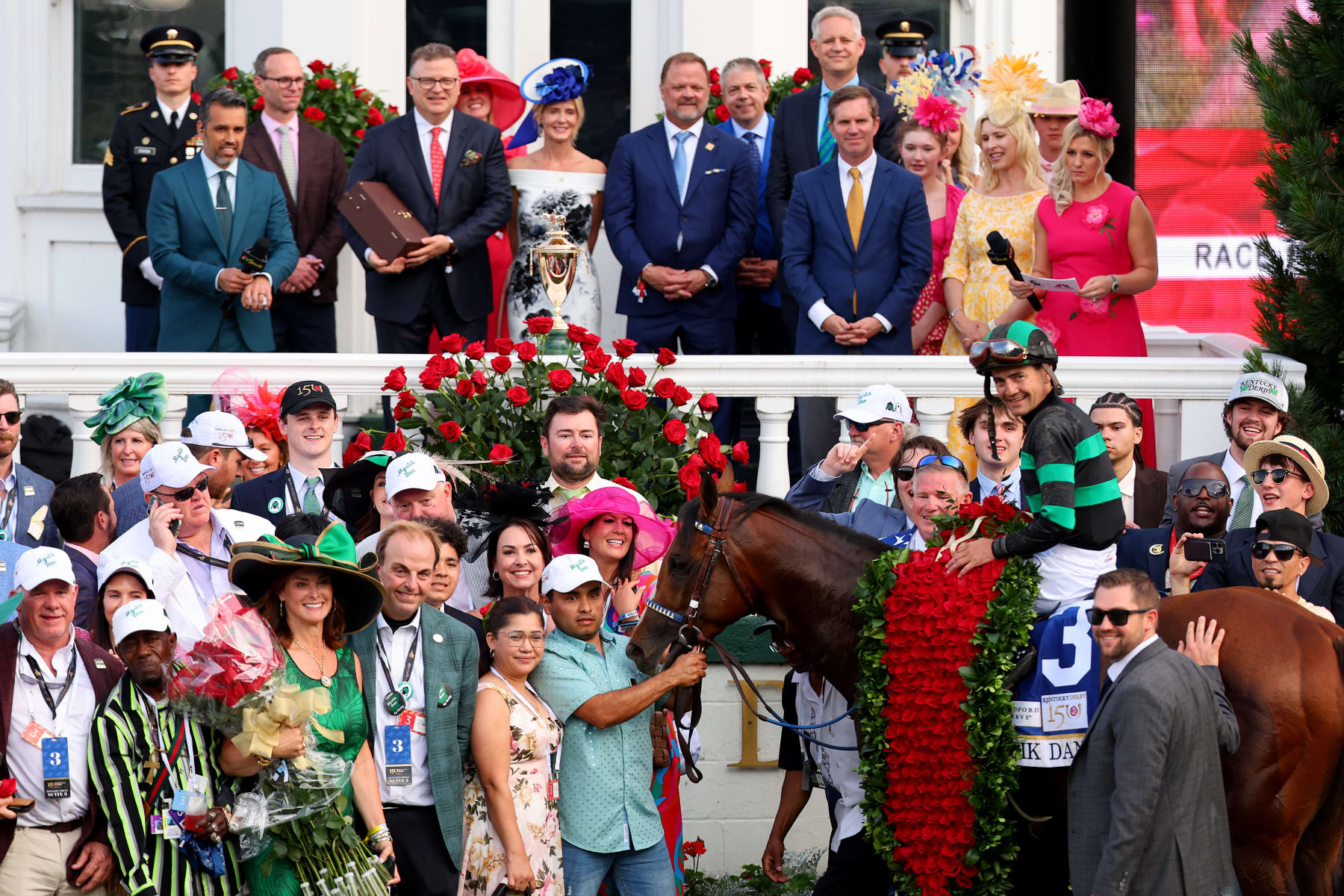 LOUISVILLE, KENTUCKY - MAY 04: Jockey Brian J. Hernandez Jr. celebrates atop of Mystik Dan in the winner circle after winning the 150th running of the Kentucky Derby at Churchill Downs on May 04, 2024 in Louisville, Kentucky. (Photo by Michael Reaves/Getty Images)