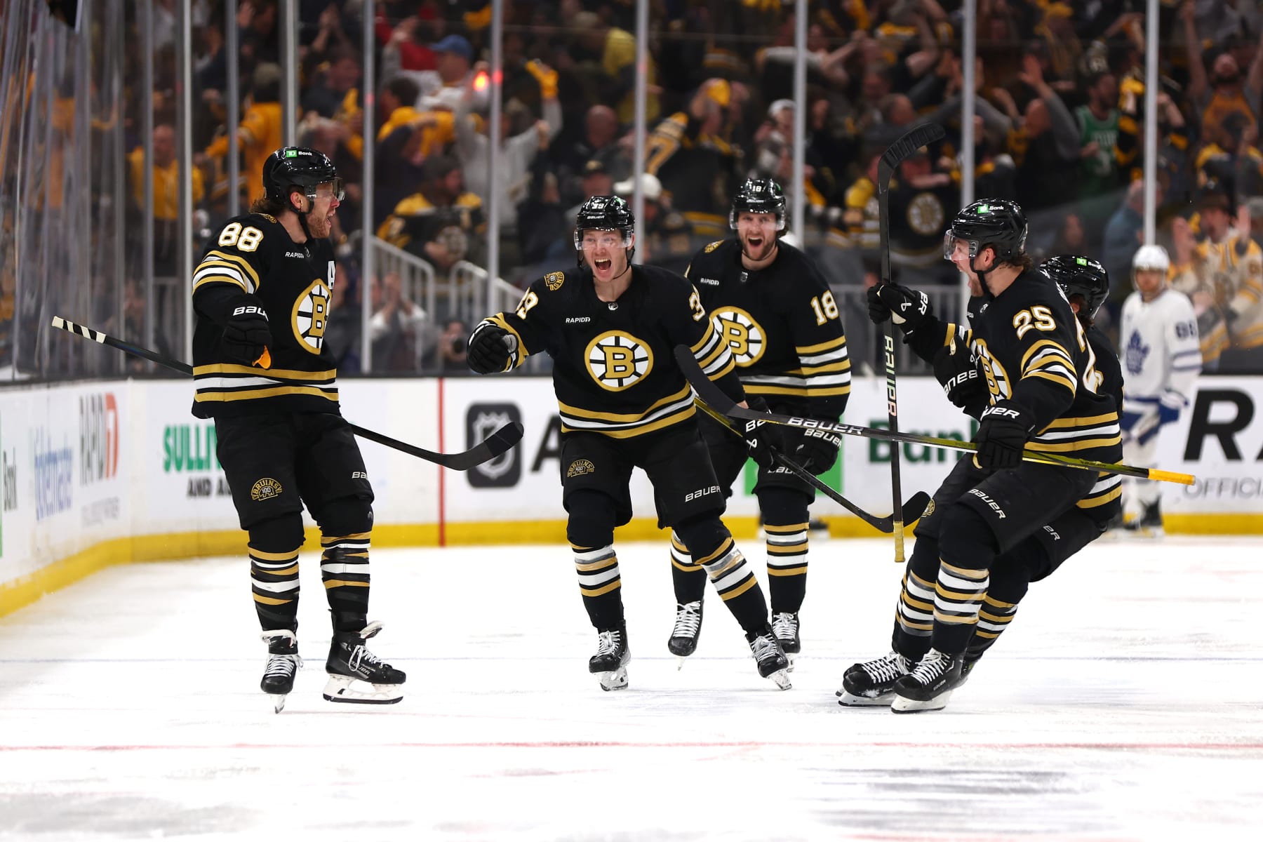 BOSTON, MASSACHUSETTS - MAY 04: David Pastrnak #88 of the Boston Bruins celebrates with his teammates after scoring the game winning goal against the Toronto Maple Leafs during overtime to win Game Seven of the First Round of the 2024 Stanley Cup Playoffs at TD Garden on May 04, 2024 in Boston, Massachusetts. (Photo by Maddie Meyer/Getty Images)