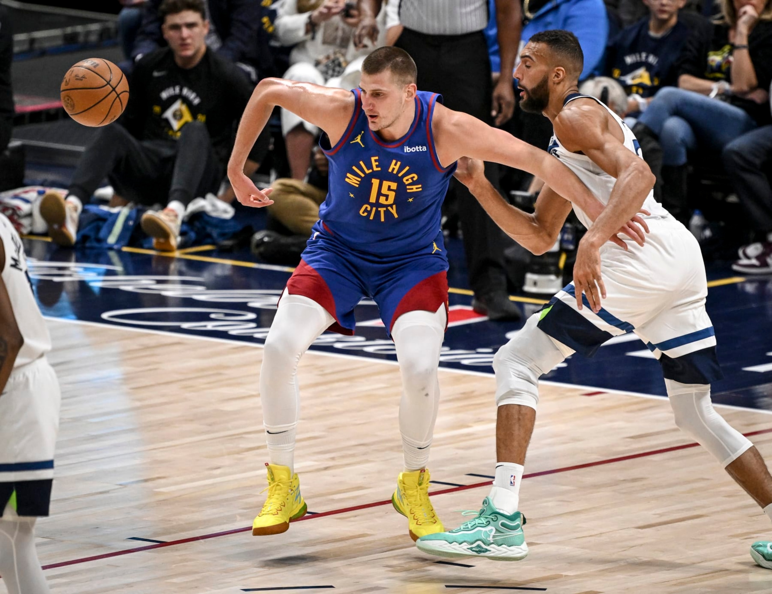 DENVER, CO - MAY 4: Rudy Gobert (27) of the Minnesota Timberwolves defends Nikola Jokic (15) of the Denver Nuggets during the first quarter at Ball Arena in Denver on Saturday, May 4, 2024. (Photo by AAron Ontiveroz/The Denver Post)