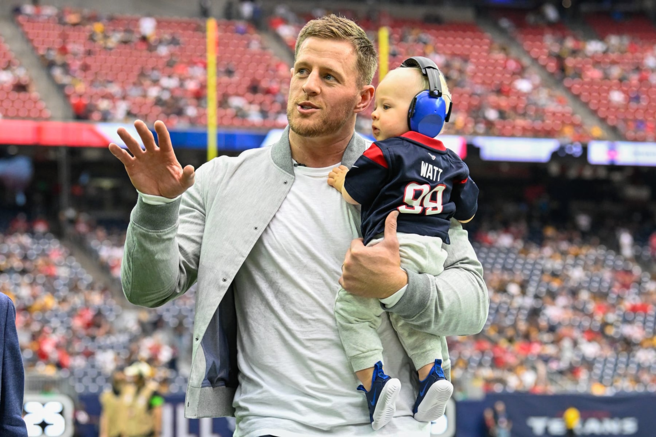 HOUSTON, TX - OCTOBER 01: Texan legend JJ Watt waves to the crowd as he make his way down the sideline before the football game between the Pittsburgh Steelers and Houston Texans at NRG Stadium on October 1, 2023, in Houston, Texas. (Photo by Ken Murray/Icon Sportswire via Getty Images)