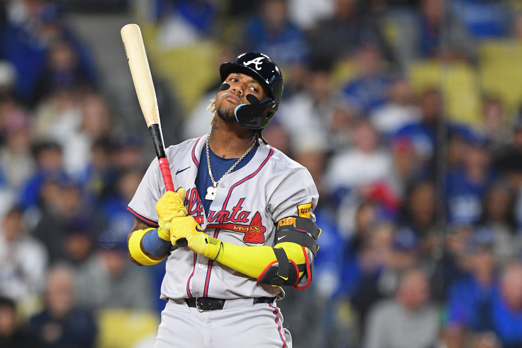 LOS ANGELES, CA - MAY 03: Atlanta Braves outfielder Ronald Acuna Jr. (13) reacts to a pitch call during the MLB game between the Atlanta Braves and the Los Angeles Dodgers on May 3, 2024 at Dodger Stadium in Los Angeles, CA. (Photo by Brian Rothmuller/Icon Sportswire via Getty Images)