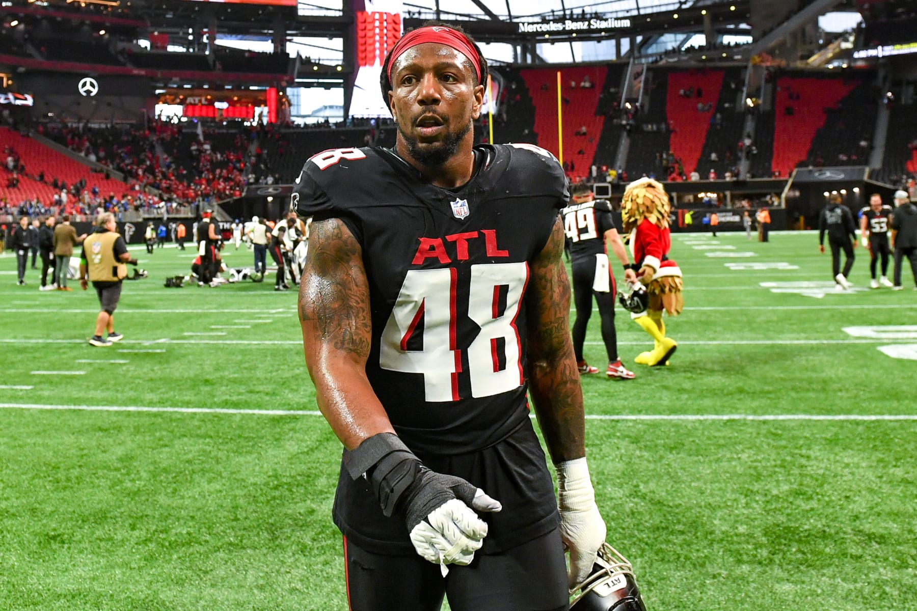 ATLANTA, GA  DECEMBER 24:  Atlanta linebacker Bud Dupree (48) reacts following the conclusion of the NFL game between the Indianapolis Colts and the Atlanta Falcons on December 24th, 2023 at Mercedes-Benz Stadium in Atlanta, GA.  (Photo by Rich von Biberstein/Icon Sportswire via Getty Images)