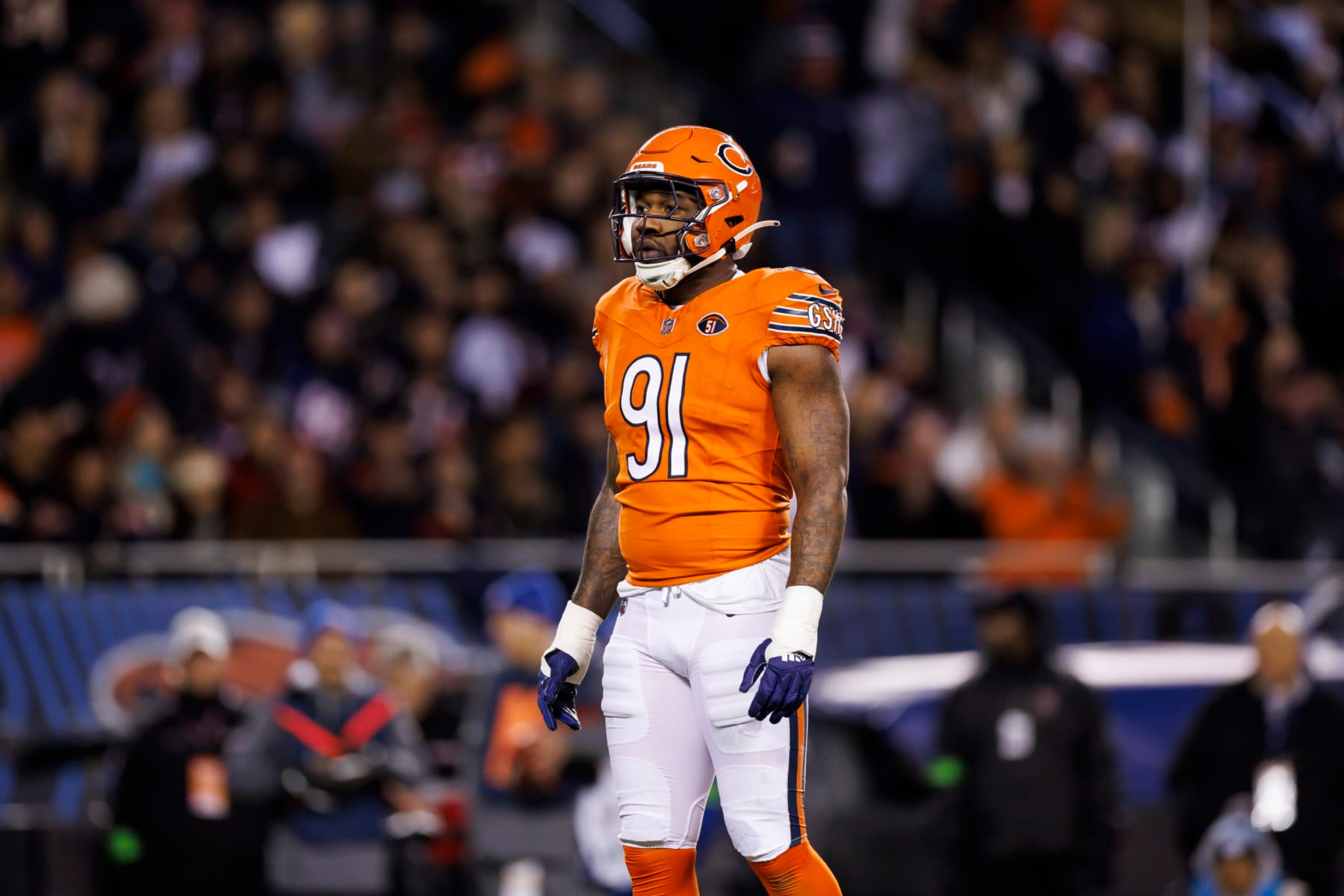 CHICAGO, ILLINOIS - NOVEMBER 09: Yannick Ngakoue #91 of the Chicago Bears looks on during an NFL football game against the Carolina Panthers at Soldier Field on November 9, 2023 in Chicago, Illinois. (Photo by Ryan Kang/Getty Images)