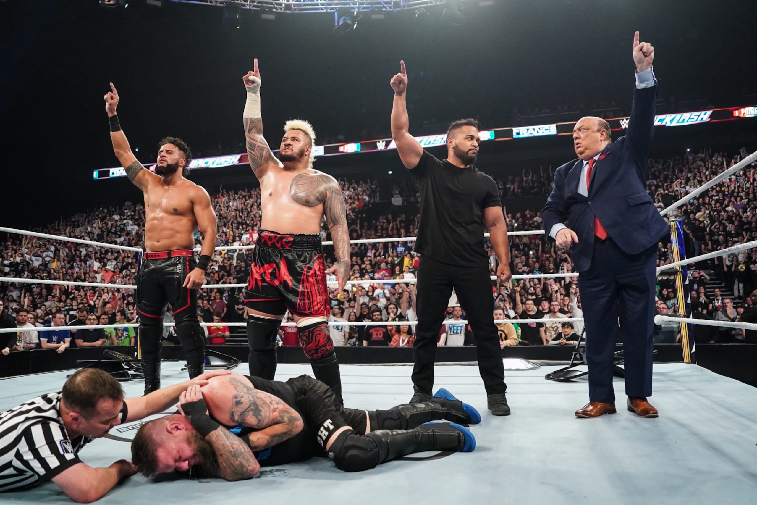 LYON, FRANCE - MAY 4: The NEW Bloodline, Tama Tonga, Solo Sikoa, Tanga Loa and Paul Heyman celebrate their win during Backlash France at LDLC Arena on May 4, 2024 in Lyon, France. (Photo by WWE/Getty Images)