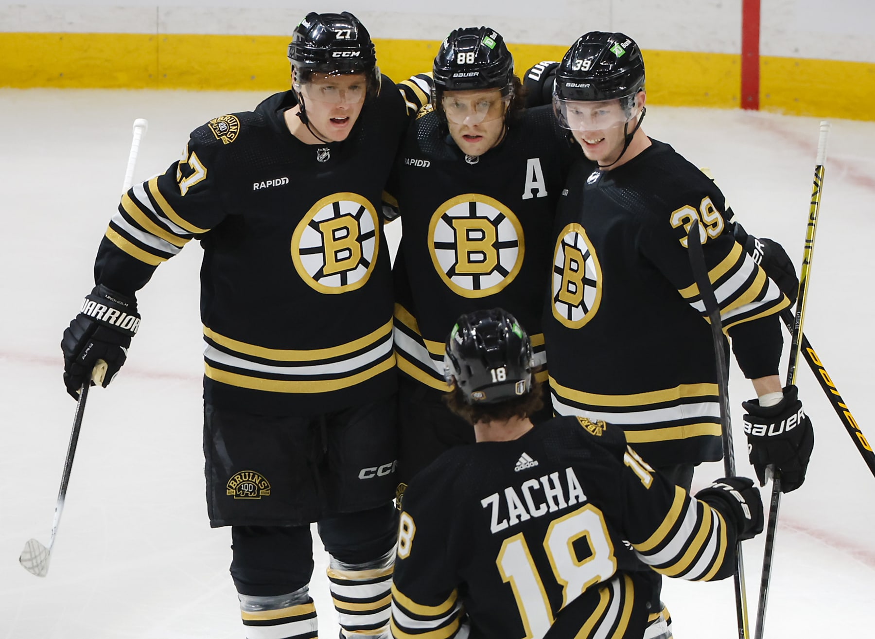 Boston, MA - April 22: Boston Bruins right wing David Pastrnak celebrates his goal with teammates Hampus Lindholm, Morgan Geekie, and Pavel Zacha in the first period. (Photo by Matthew J. Lee/The Boston Globe via Getty Images) Boston, MA - April 22: Boston Bruins right wing David Pastrnak celebrates his goal with teammates Hampus Lindholm, Morgan Geekie, and Pavel Zacha in the first period. (Photo by Matthew J. Lee/The Boston Globe via Getty Images)