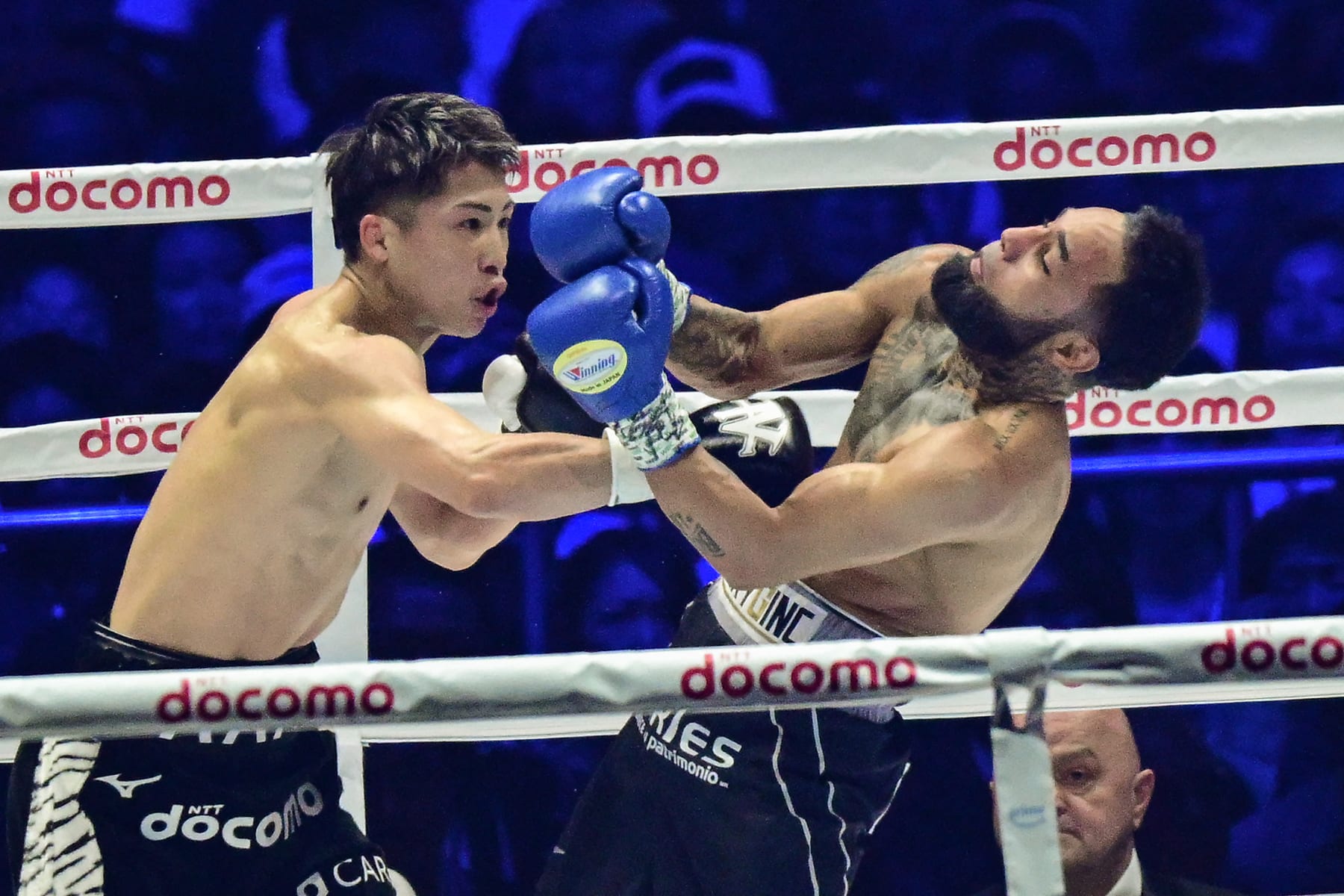 Japan's Naoya Inoue (L) fights against Mexico's Luis Nery during their IBF-WBA-WBC-WBO super-bantamweight title boxing match at the Tokyo Dome in Tokyo on May 6, 2024. (Photo by Philip FONG / AFP) (Photo by PHILIP FONG/AFP via Getty Images)
