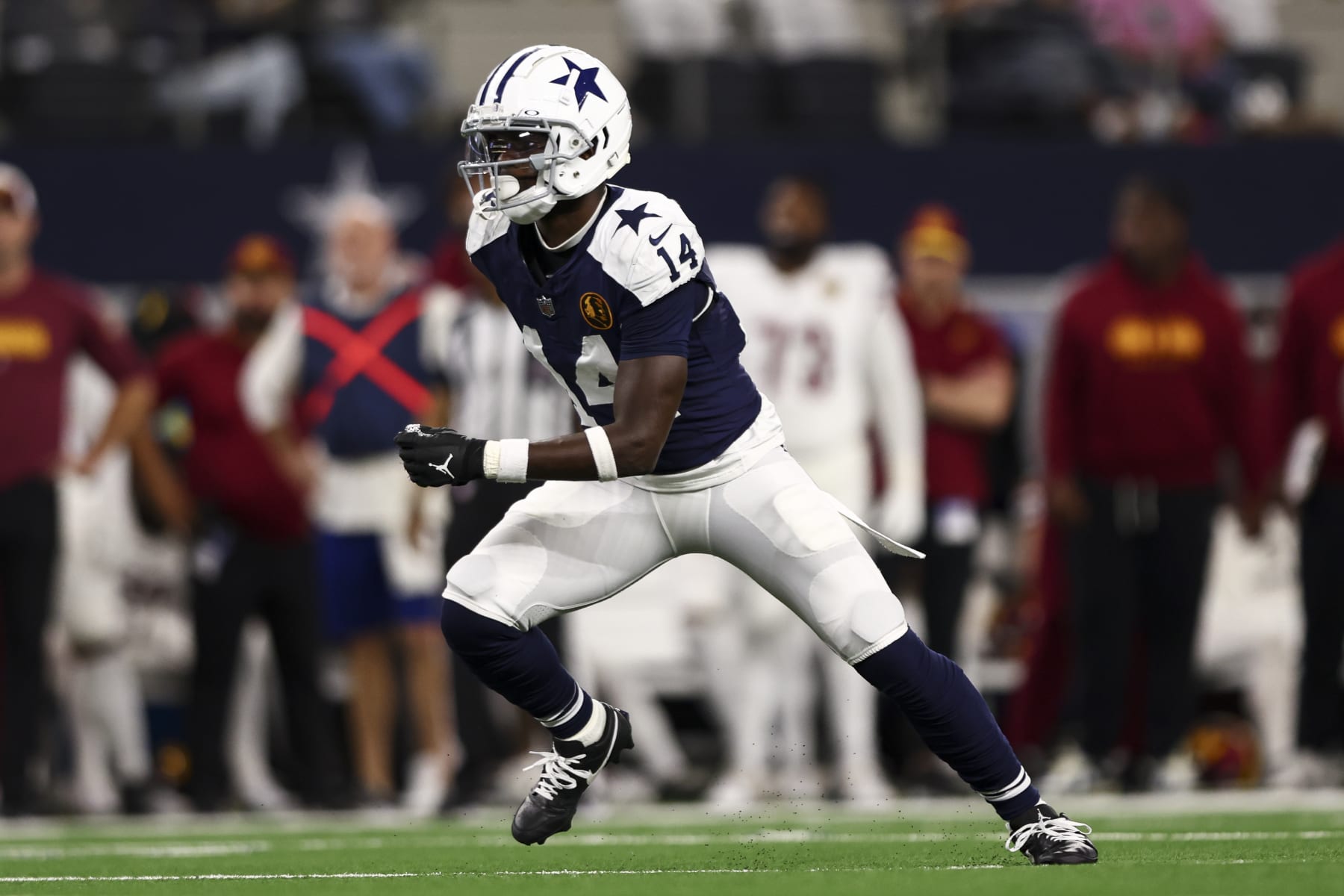 ARLINGTON, TX - NOVEMBER 23: Markquese Bell #14 of the Dallas Cowboys runs downfield during an NFL football game against the Washington Commanders at AT&T Stadium on November 23, 2023 in Arlington, Texas. (Photo by Kevin Sabitus/Getty Images)