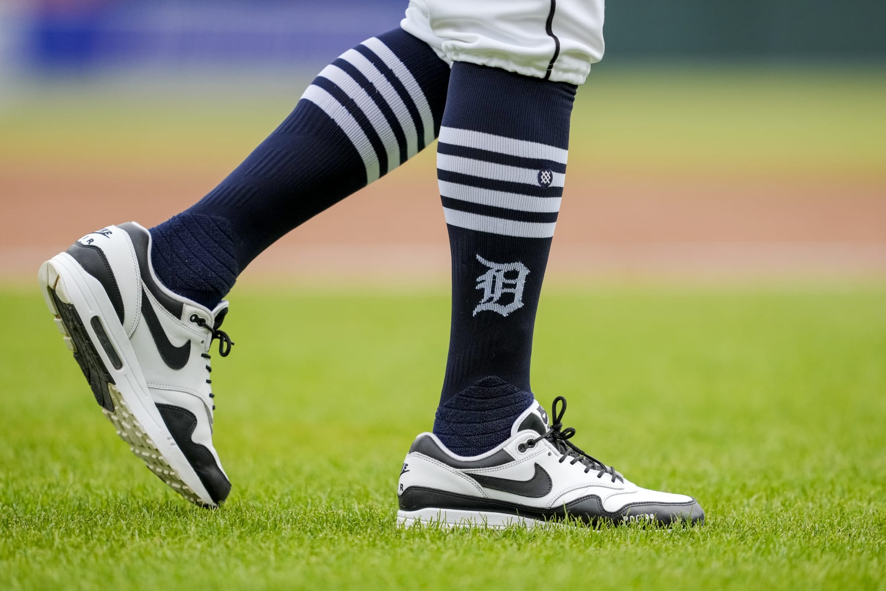 DETROIT, MICHIGAN - APRIL 28: A detail of the Nike sneakers and Stance socks with the Detroit Tigers logo worn by Anthony Iapoce #99 of the Detroit Tigers against the Kansas City Royals at Comerica Park on April 28, 2024 in Detroit, Michigan. (Photo by Nic Antaya/Getty Images)