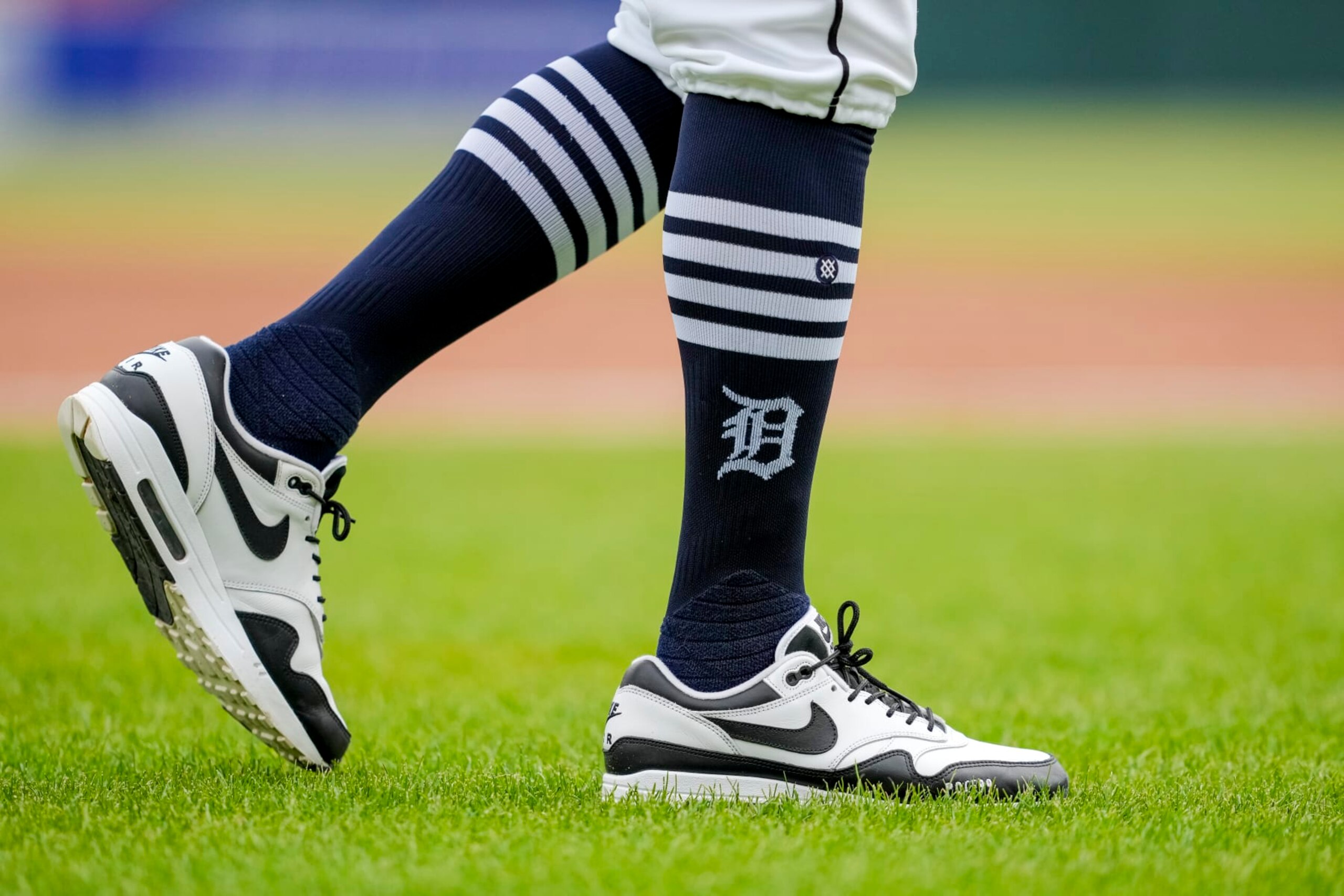 DETROIT, MICHIGAN - APRIL 28: A detail of the Nike sneakers and Stance socks with the Detroit Tigers logo worn by Anthony Iapoce #99 of the Detroit Tigers against the Kansas City Royals at Comerica Park on April 28, 2024 in Detroit, Michigan. (Photo by Nic Antaya/Getty Images)