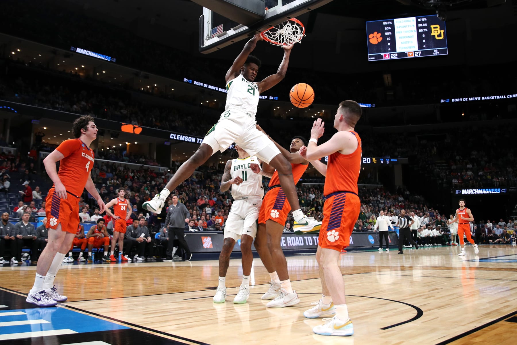 MEMPHIS, TENNESSEE - MARCH 24: Yves Missi #21 of the Baylor Bears dunks the ball against the Clemson Tigers during the first half in the second round of the NCAA Men's Basketball Tournament at FedExForum on March 24, 2024 in Memphis, Tennessee. (Photo by Justin Ford/Getty Images)
