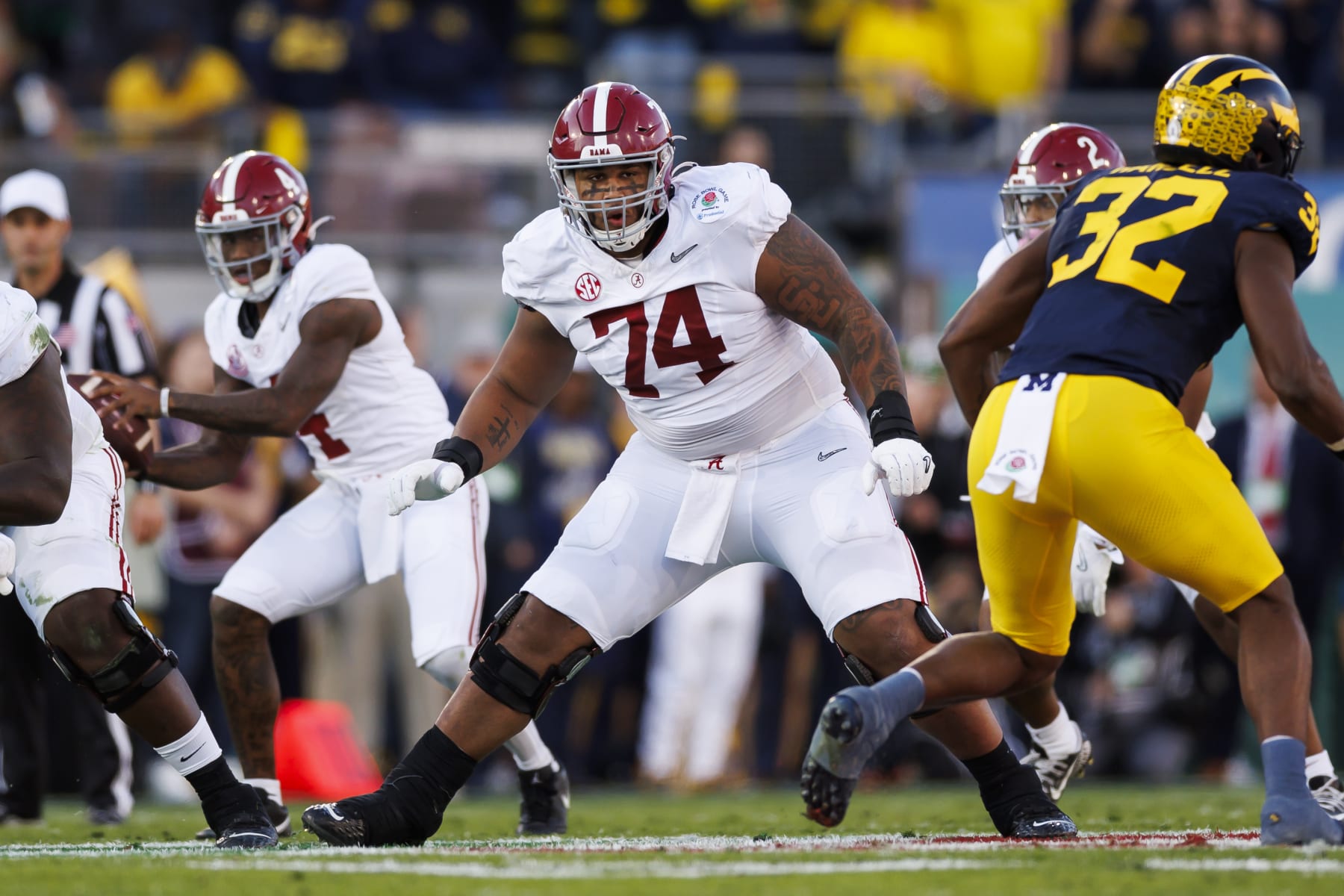 PASADENA, CALIFORNIA - JANUARY 01: Offensive lineman Kadyn Proctor #74 of the Alabama Crimson Tide blocks during the CFP Semifinal Rose Bowl Game against the Michigan Wolverines at Rose Bowl Stadium on January 1, 2024 in Pasadena, California. (Photo by Ryan Kang/Getty Images)