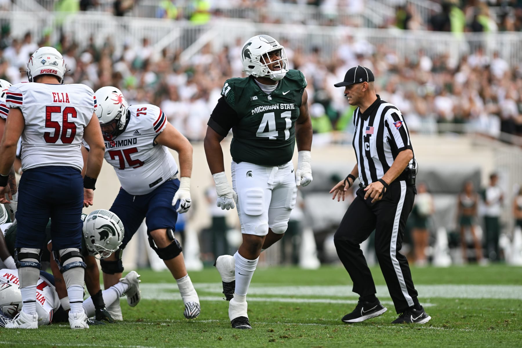 EAST LANSING, MI - SEPTEMBER 09: Michigan State Spartans defensive tackle Derrick Harmon (41) reacts to a defensive stop during a college football game between the Michigan State Spartans and Richmond Spiders on September 9, 2023 at Spartan Stadium in East Lansing, MI. (Photo by Adam Ruff/Icon Sportswire via Getty Images)
