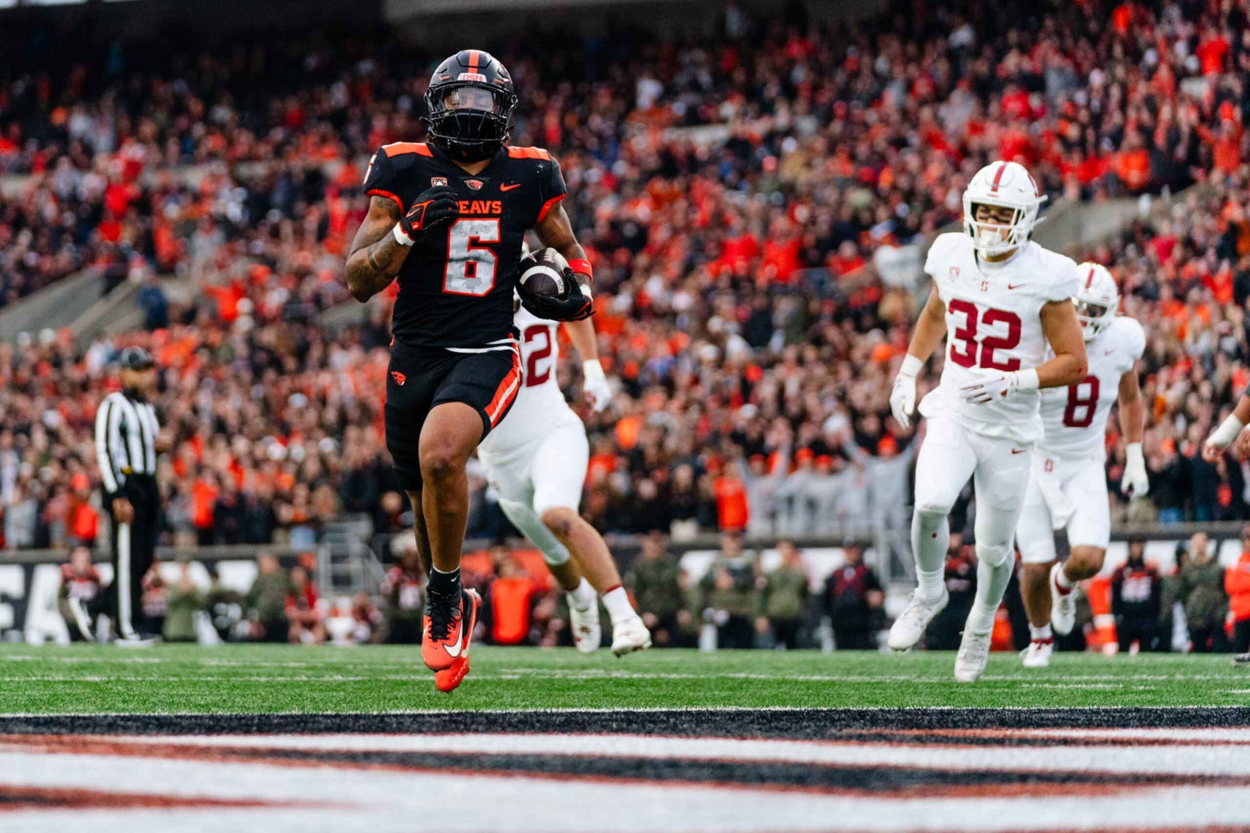CORVALLIS, OREGON - NOVEMBER 11: Running back Damien Martinez #6 of the Oregon State Beavers scores on a 15 yard touchdown rush during the first half of the game against the Stanford Cardinals at Reser Stadium on November 11, 2023 in Corvallis, Oregon. (Photo by Ali Gradischer/Getty Images)