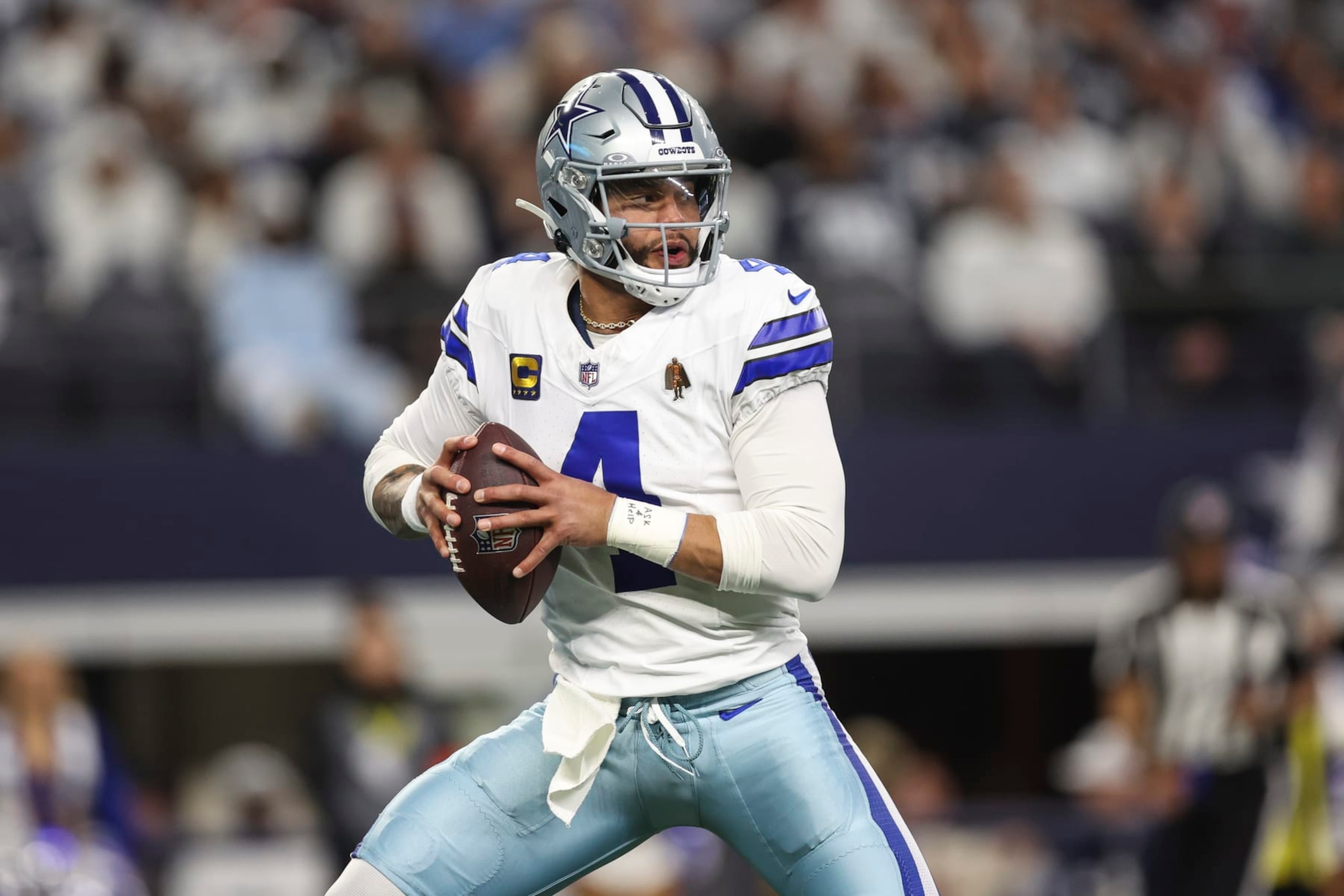ARLINGTON, TX - JANUARY 14: Dak Prescott #4 of the Dallas Cowboys drops back to pass during an NFL wild-card playoff football game against the Green Bay Packers at AT&T Stadium on January 14, 2024 in Arlington, Texas. (Photo by Perry Knotts/Getty Images) ARLINGTON, TX - JANUARY 14: Dak Prescott #4 of the Dallas Cowboys drops back to pass during an NFL wild-card playoff football game against the Green Bay Packers at AT&T Stadium on January 14, 2024 in Arlington, Texas. (Photo by Perry Knotts/Getty Images)
