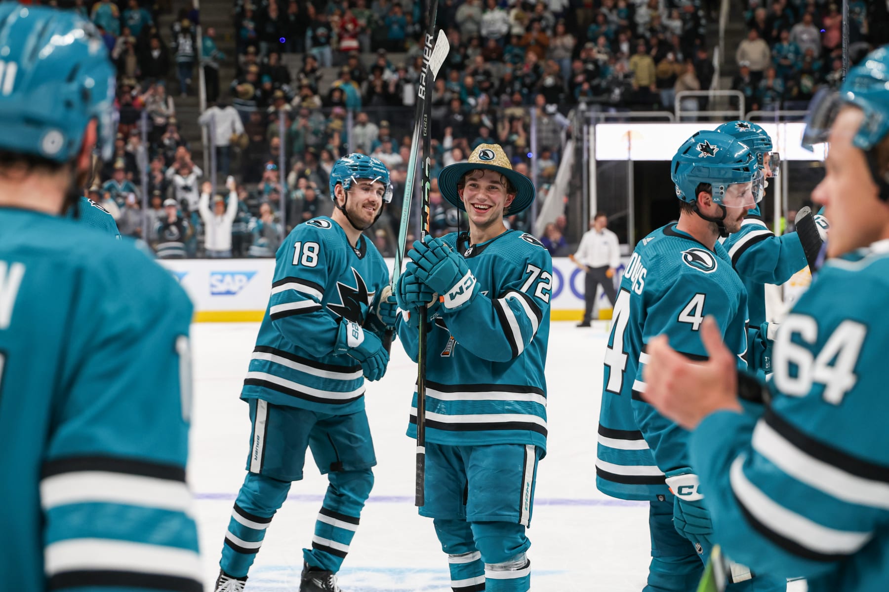 SAN JOSE, CA - APRIL 6: William Eklund #72 of the San Jose Sharks celebrates with teammates on the ice after scoring a hat trick in overtime against the St. Louis Blues at SAP Center on April 6, 2024 in San Jose, California. (Photo by Panayiota Good/NHLI via Getty Images)