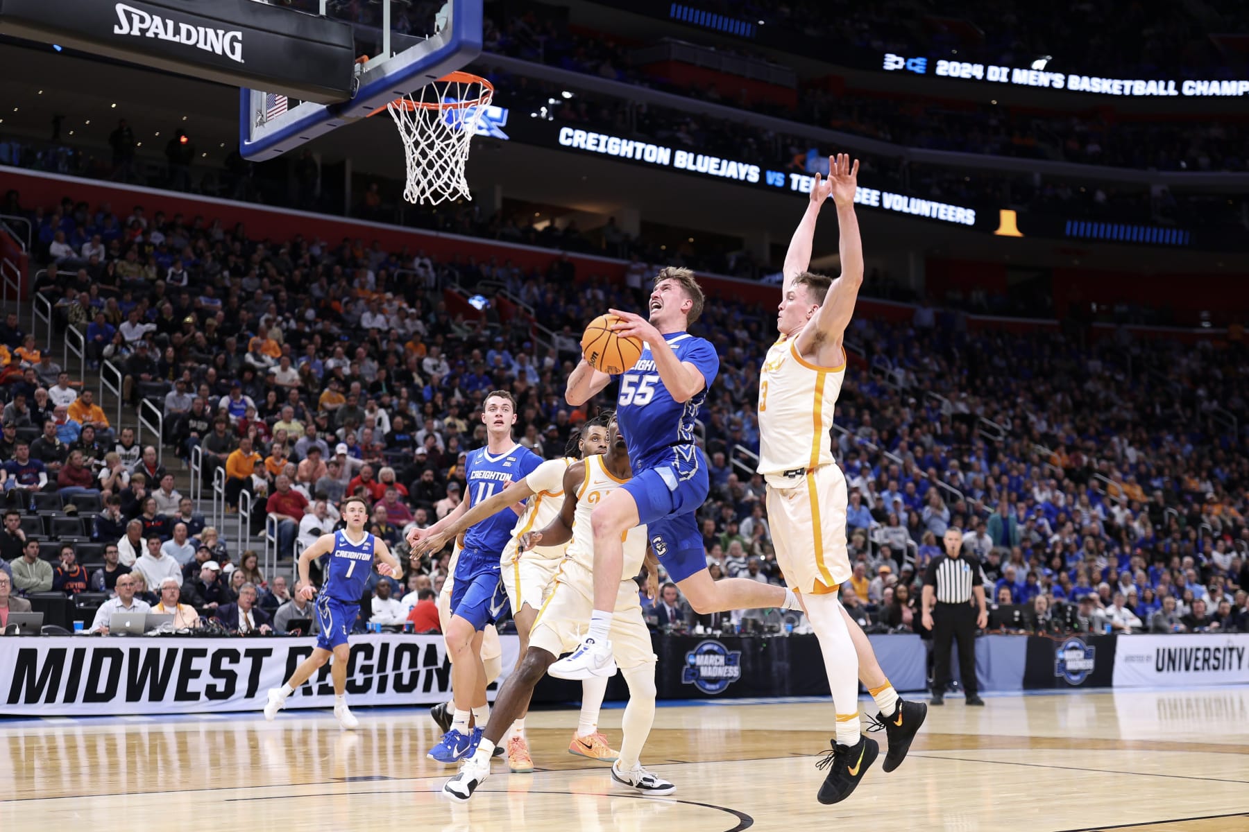 DETROIT, MICHIGAN - MARCH 29: Baylor Scheierman #55 of the Creighton Bluejays drives to the basket during the first half against the Tennessee Volunteers in the Sweet 16 round of the NCAA Men's Basketball Tournament at Little Caesars Arena on March 29, 2024 in Detroit, Michigan. (Photo by Mike Mulholland/Getty Images)