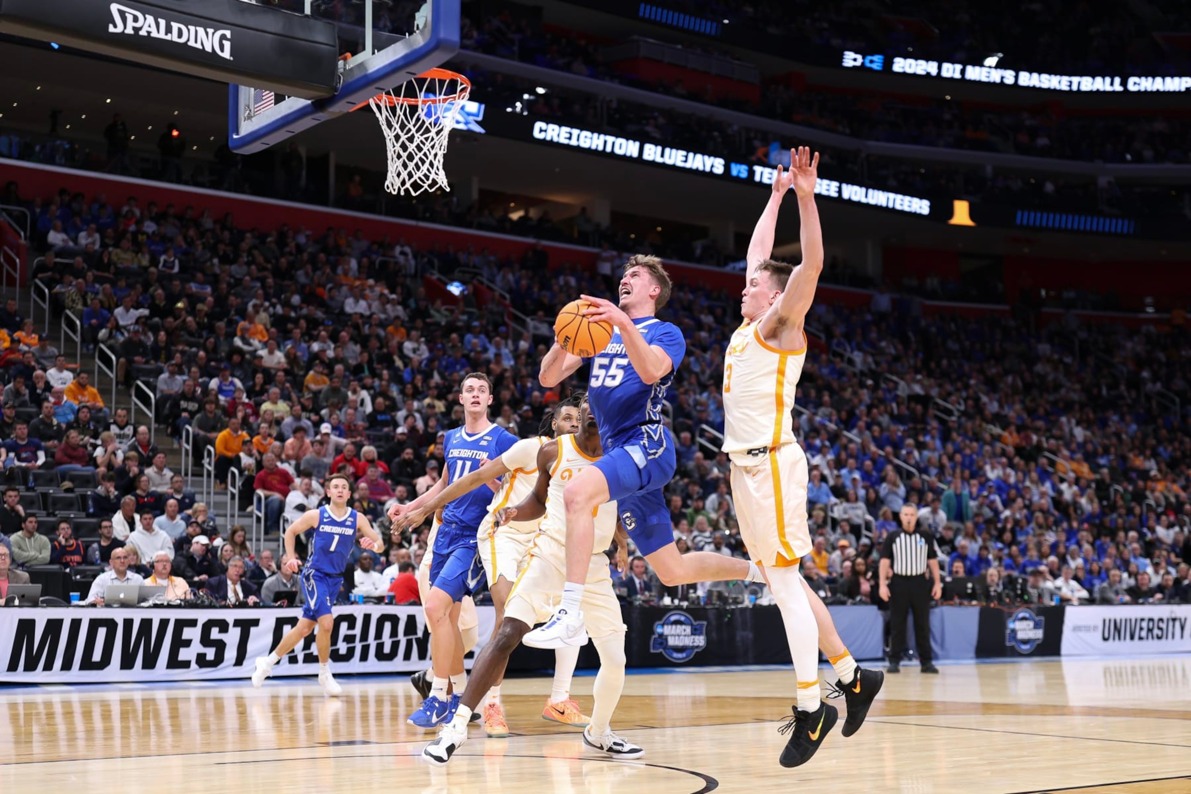 DETROIT, MICHIGAN - MARCH 29: Baylor Scheierman #55 of the Creighton Bluejays drives to the basket during the first half against the Tennessee Volunteers in the Sweet 16 round of the NCAA Men's Basketball Tournament at Little Caesars Arena on March 29, 2024 in Detroit, Michigan. (Photo by Mike Mulholland/Getty Images) DETROIT, MICHIGAN - MARCH 29: Baylor Scheierman #55 of the Creighton Bluejays drives to the basket during the first half against the Tennessee Volunteers in the Sweet 16 round of the NCAA Men's Basketball Tournament at Little Caesars Arena on March 29, 2024 in Detroit, Michigan. (Photo by Mike Mulholland/Getty Images)
