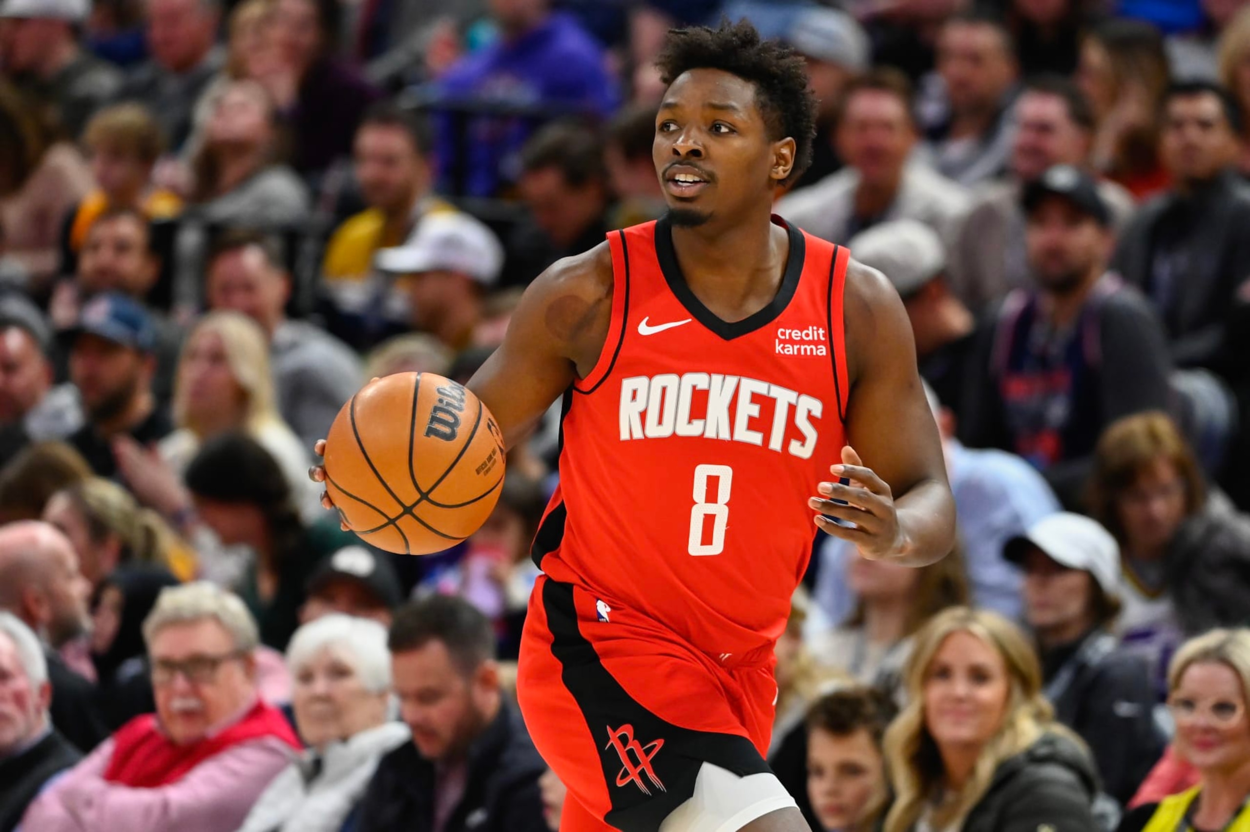 SALT LAKE CITY, UTAH - MARCH 29: Jae'Sean Tate #8 of the Houston Rockets dribbles during the first half of a game against the Utah Jazz at Delta Center on March 29, 2024 in Salt Lake City, Utah. NOTE TO USER: User expressly acknowledges and agrees that, by downloading and or using this photograph, User is consenting to the terms and conditions of the Getty Images License Agreement.  (Photo by Alex Goodlett/Getty Images)