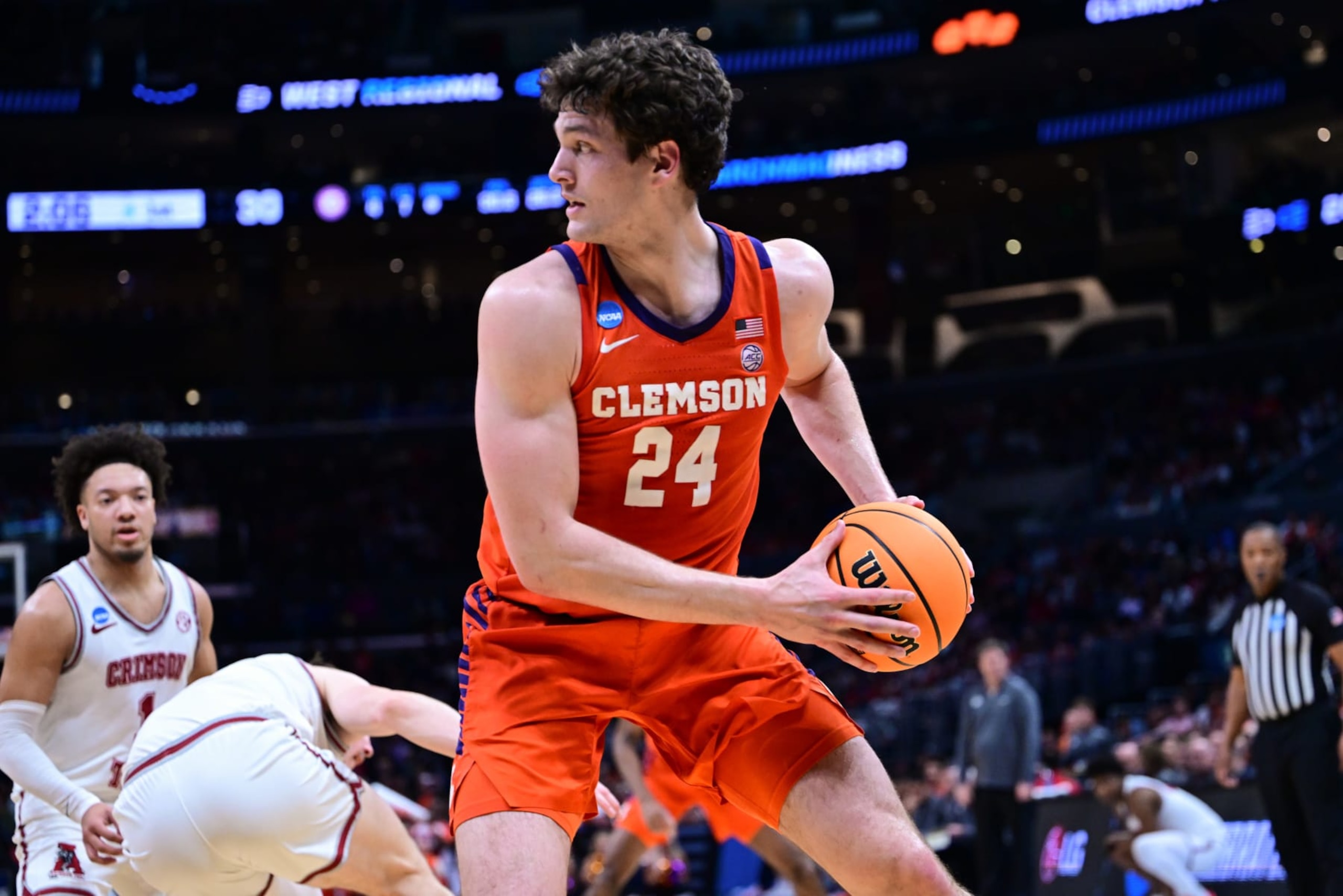 LOS ANGELES, CALIFORNIA - MARCH 30: PJ Hall #24 of the Clemson Tigers controls the ball against the Alabama Crimson Tide during the Elite Eight round of the 2024 NCAA Men's Basketball Tournament held at Crypto.com Arena on March 30, 2024 in Los Angeles, California. (Photo by Ben Solomon/NCAA Photos via Getty Images)